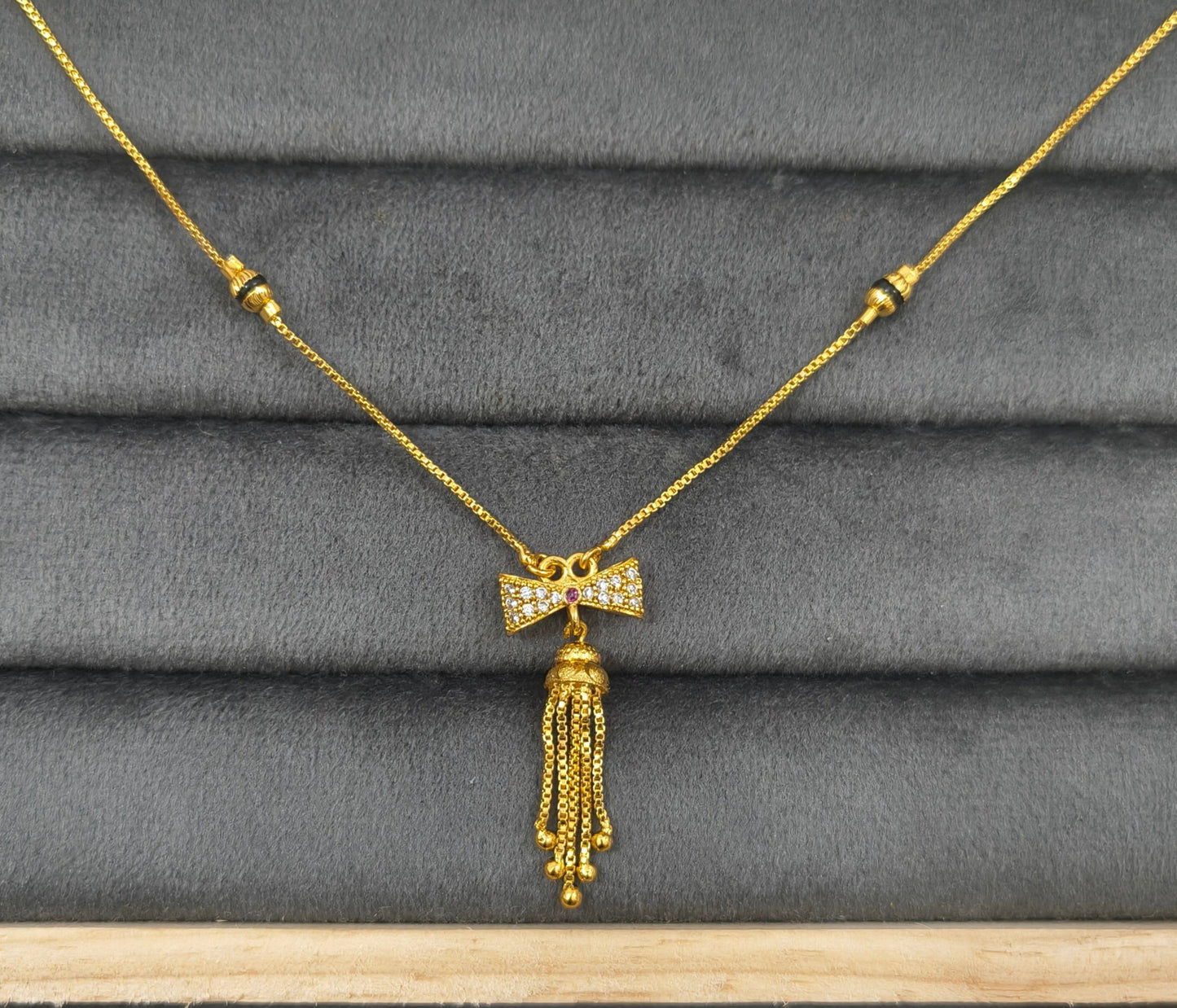 Daily Wear Black Beaded Classic Bow Pendant Mangalsutra