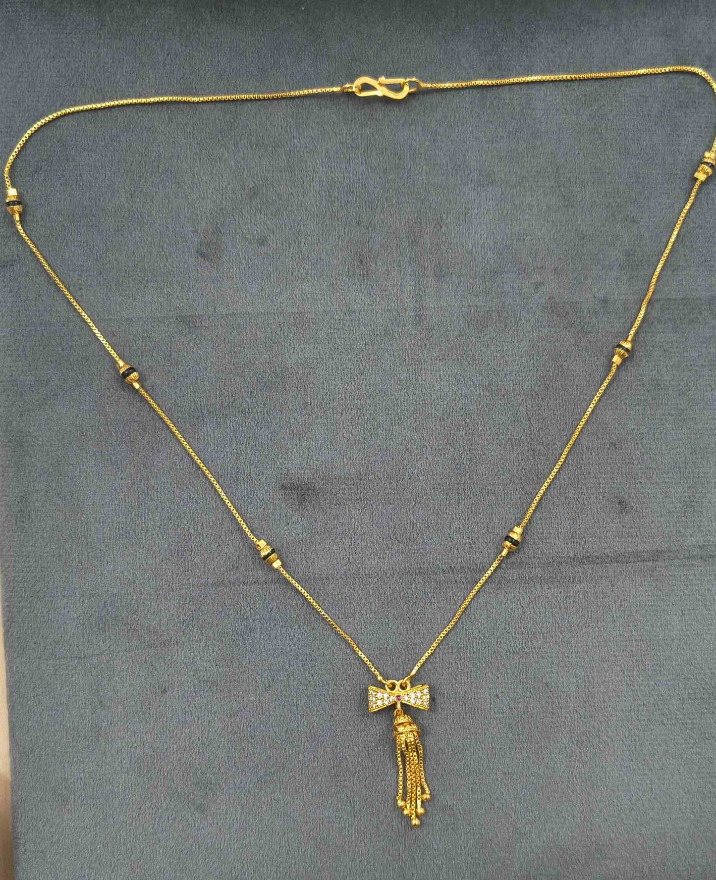 Daily Wear Black Beaded Classic Bow Pendant Mangalsutra