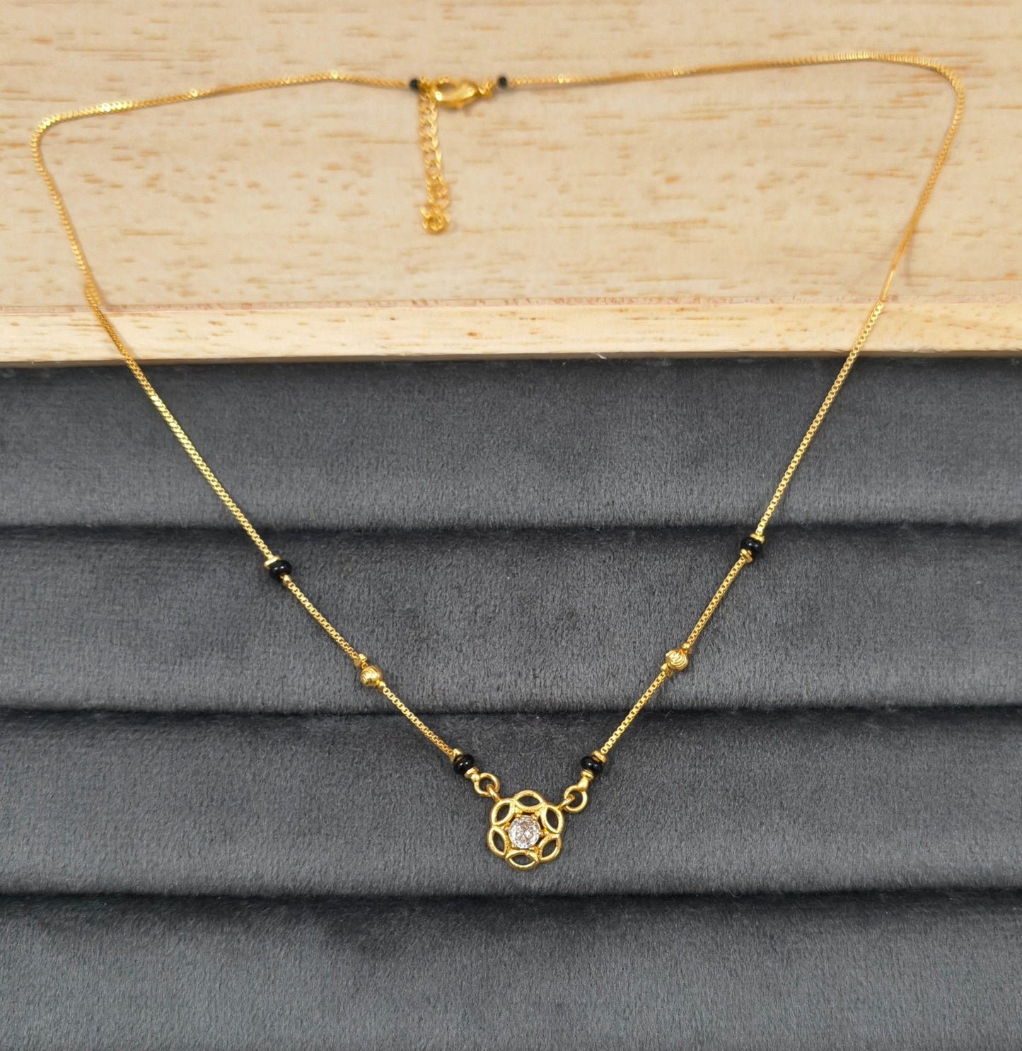 Daily Wear Black Beaded Floral Solitaire Pendant Mangalsutra