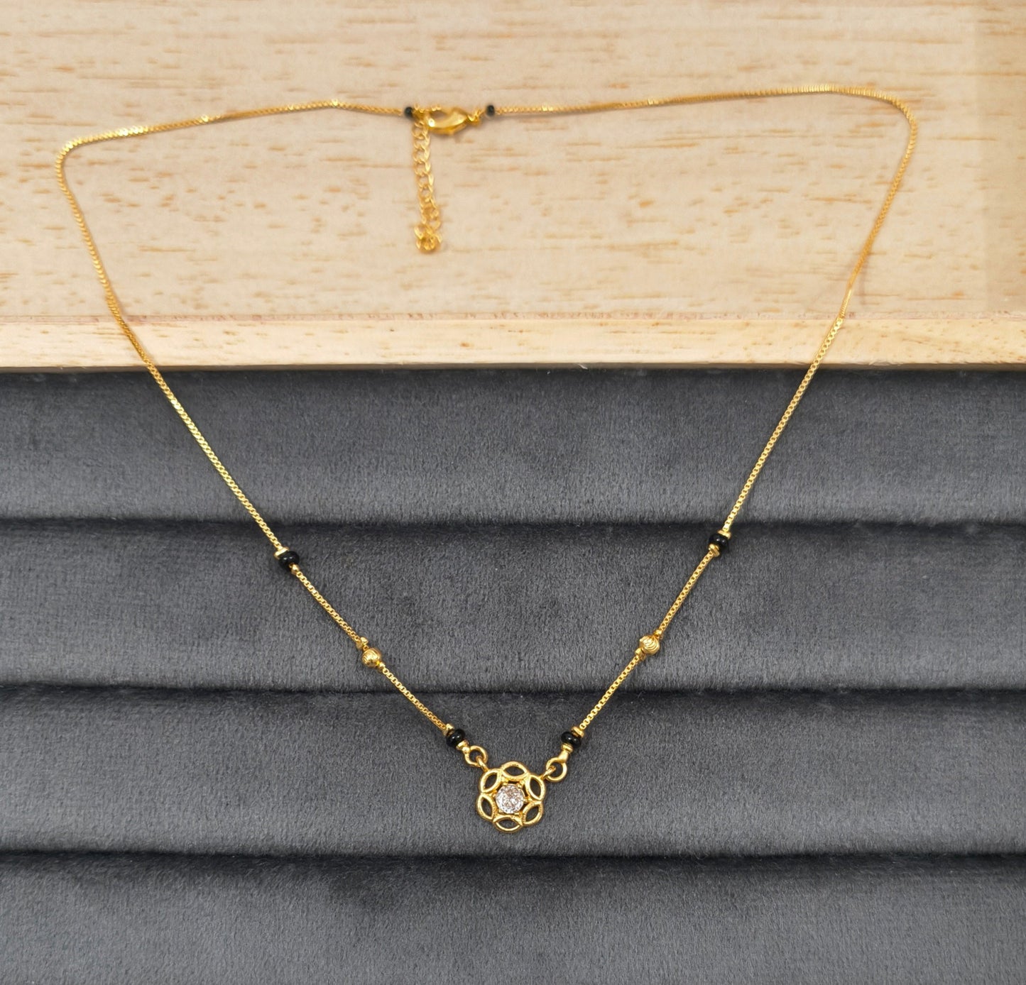 Daily Wear Black Beaded Floral Solitaire Pendant Mangalsutra