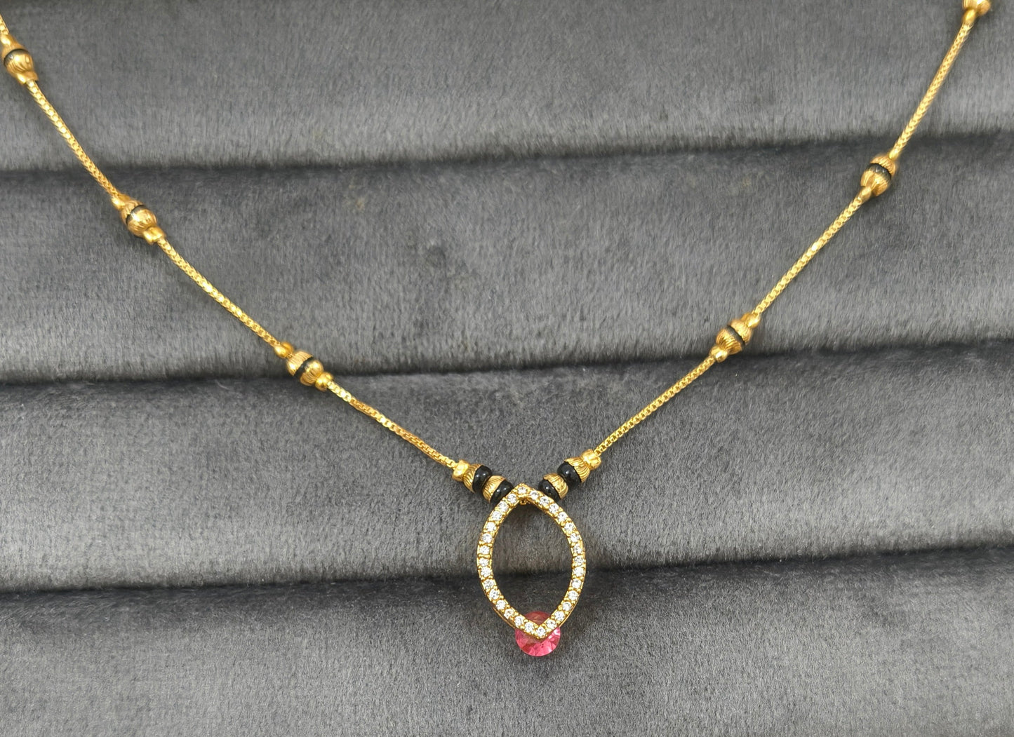 Daily Wear Black Beaded Hollow Oval Pendant Mangalsutra