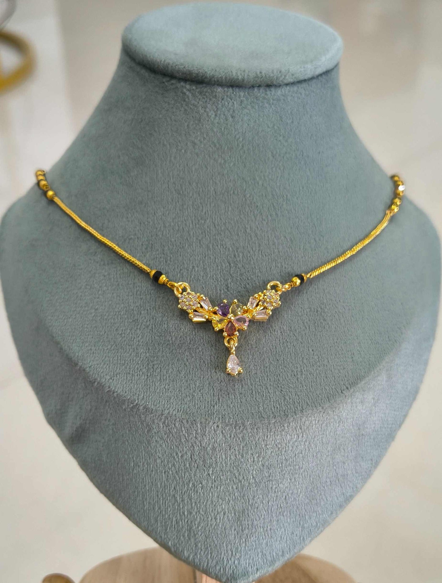 Daily Wear Mangalsutra Black Beaded Multi Stone Pendant