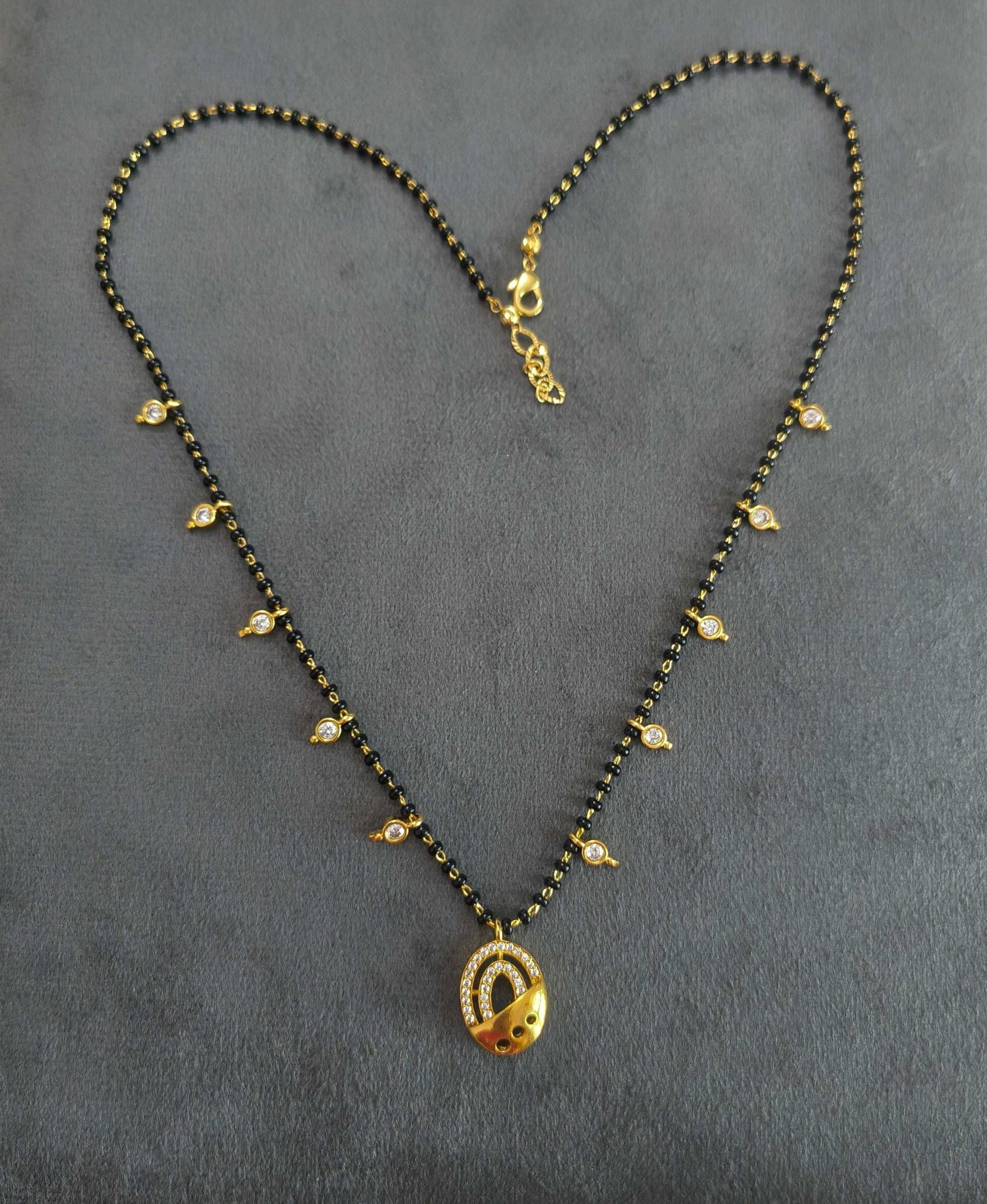 Dazzling Stone Studded Oval Pendant Beaded Mangalsutra Chain