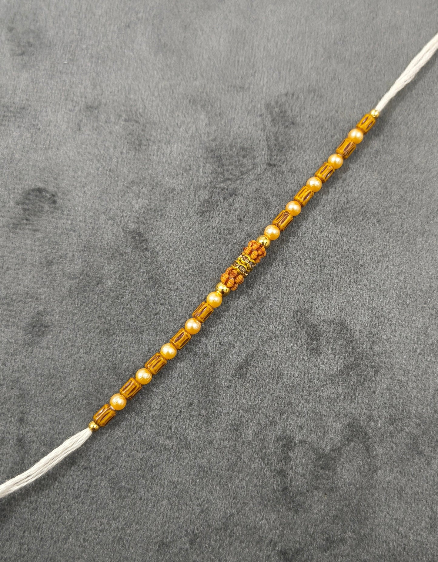 Designer Golden and Wooden Beads Rakhi for Brother