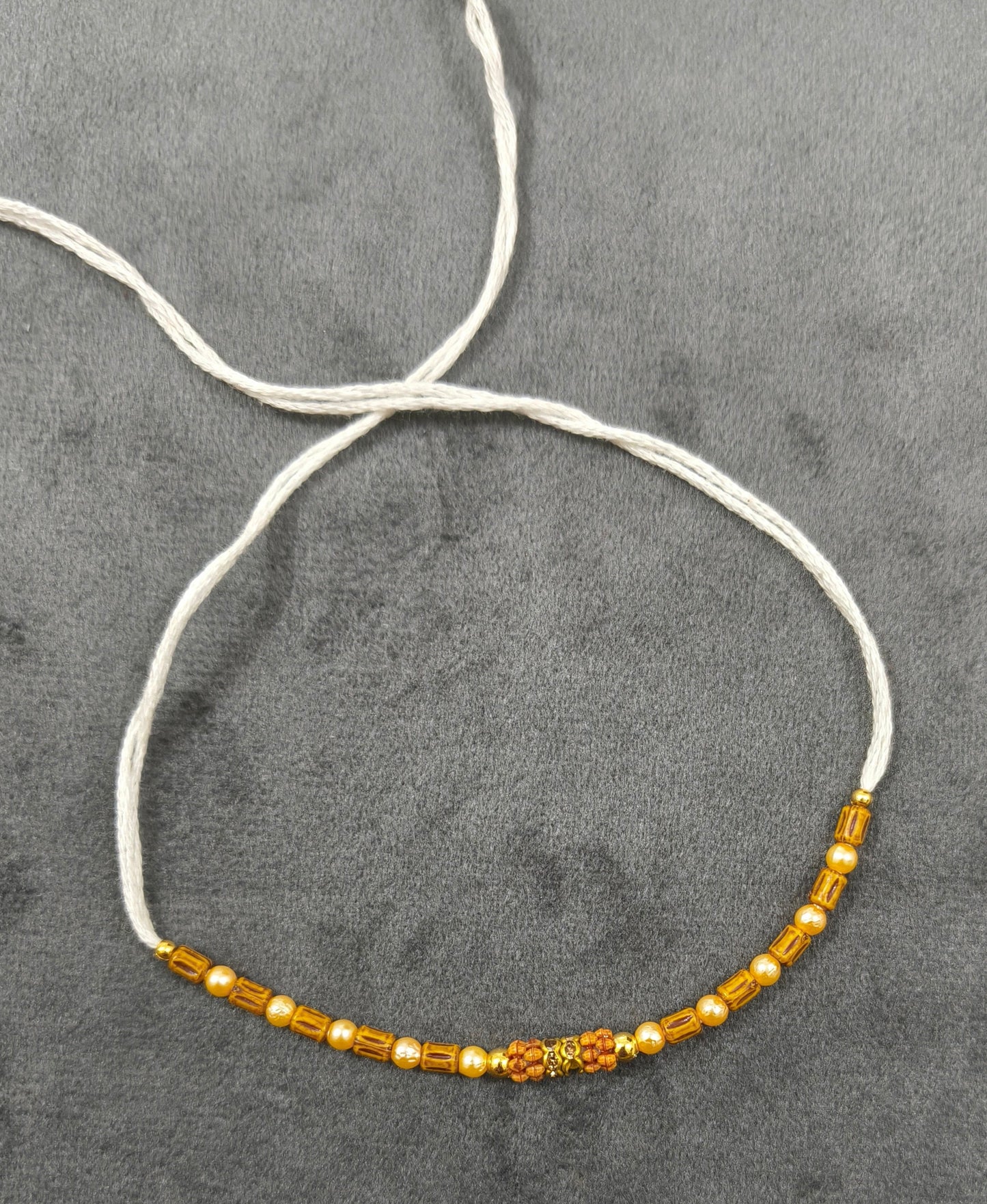 Designer Golden and Wooden Beads Rakhi for Brother