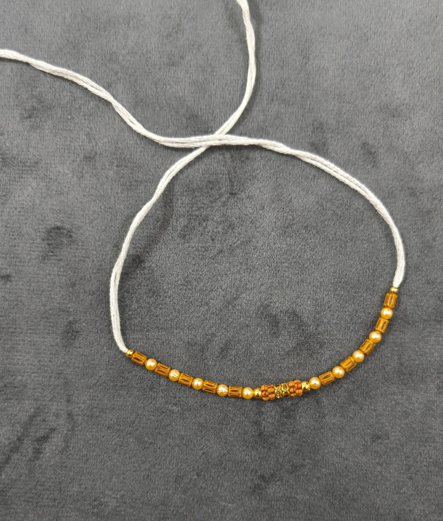 Designer Golden and Wooden Beads Rakhi for Brother