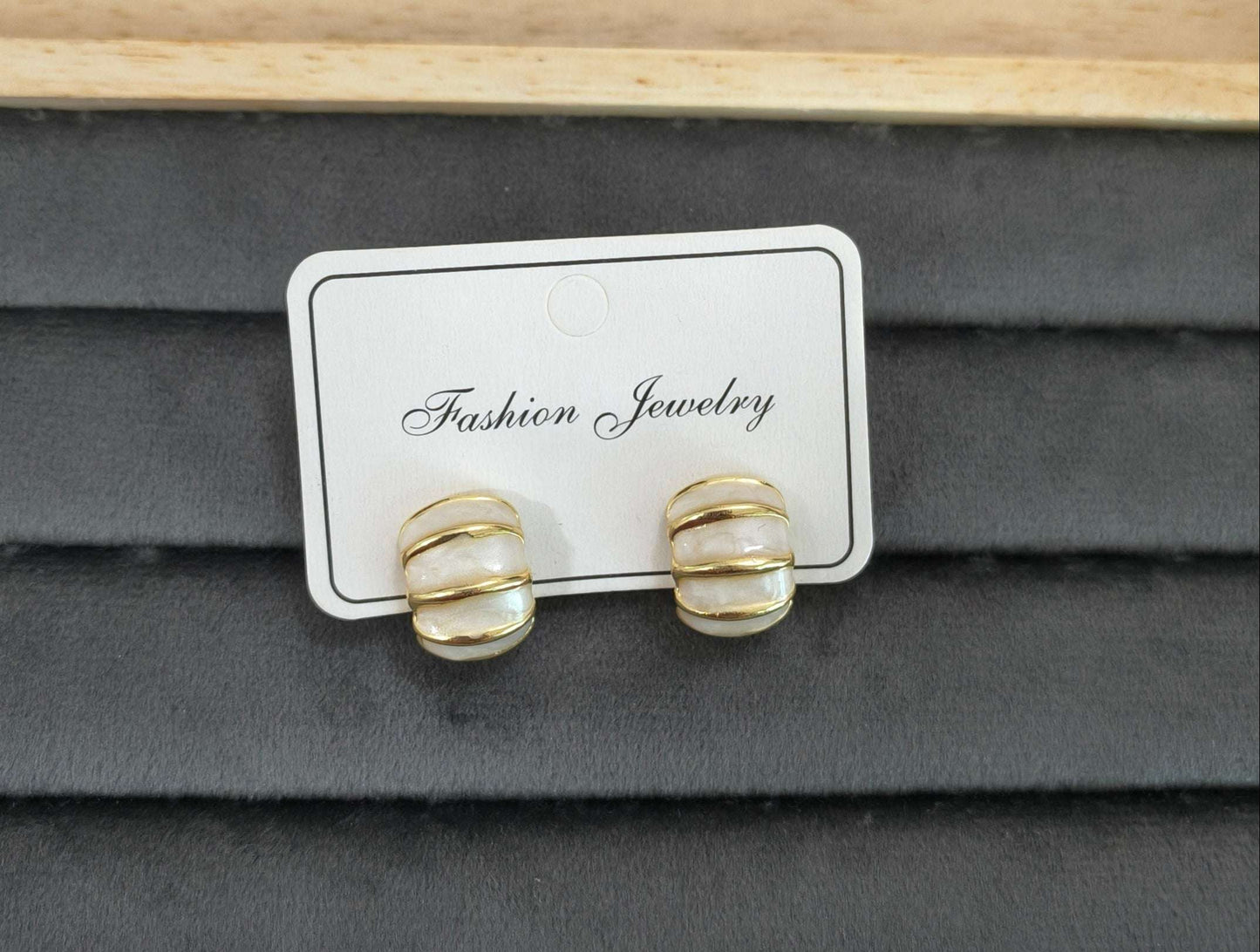 Fancy Anitarnish White Golden Toned Enamel Earrings