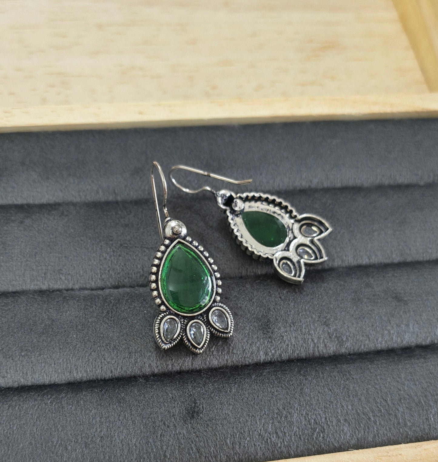 German Silver Toned Emerald Stone Studded Earrings