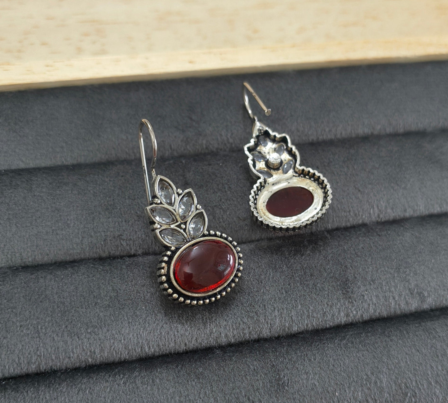German Silver Toned Red Colored Stone Studded Earrings