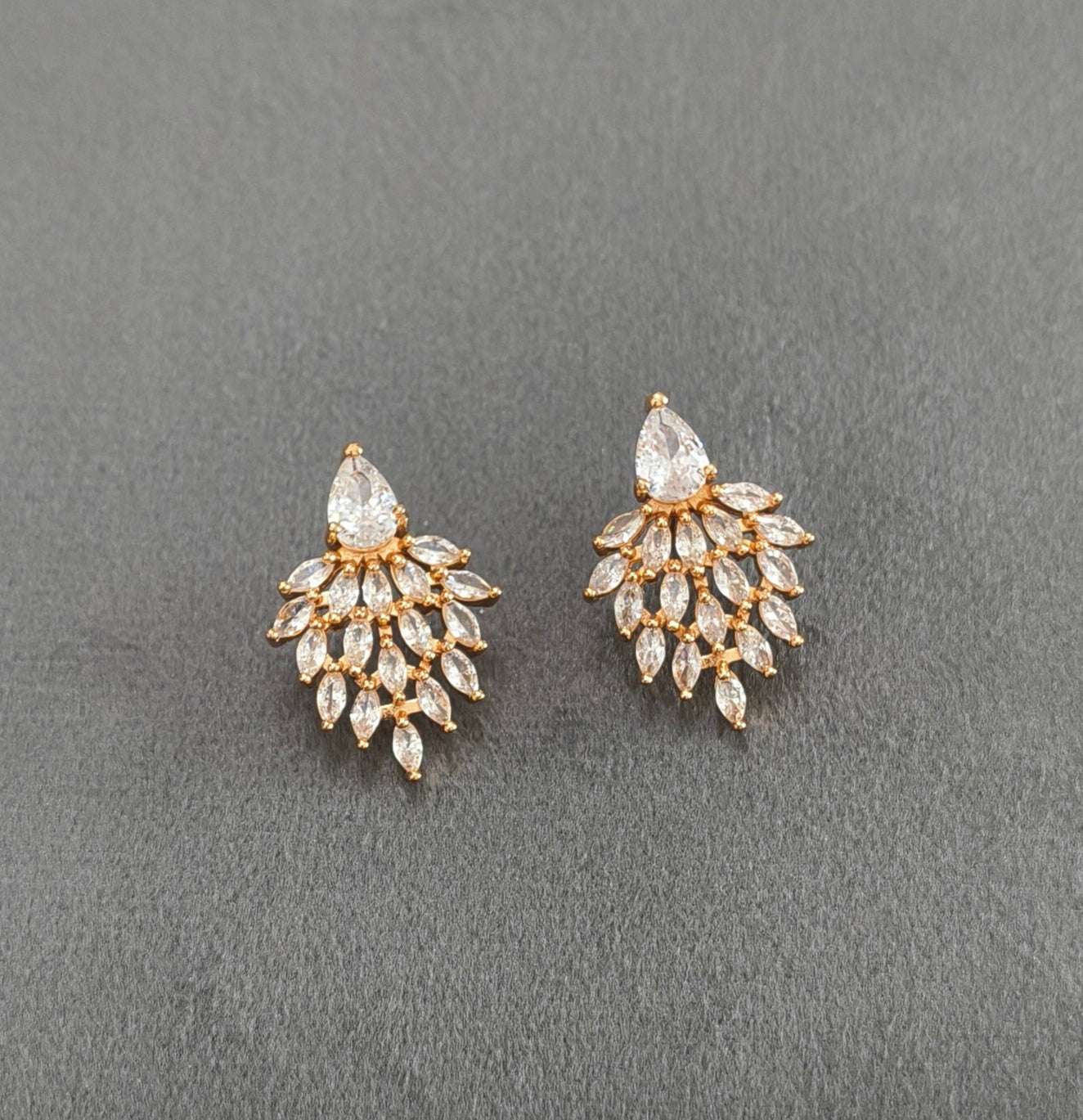 Gold Plated AD Stone Studded Leaf Shape Statement Earring