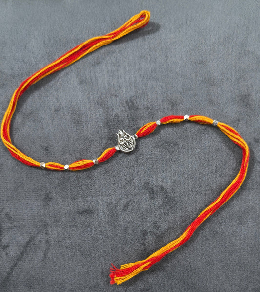 Auspicious Silver Toned Shiv Trishul Rakhi for Brother
