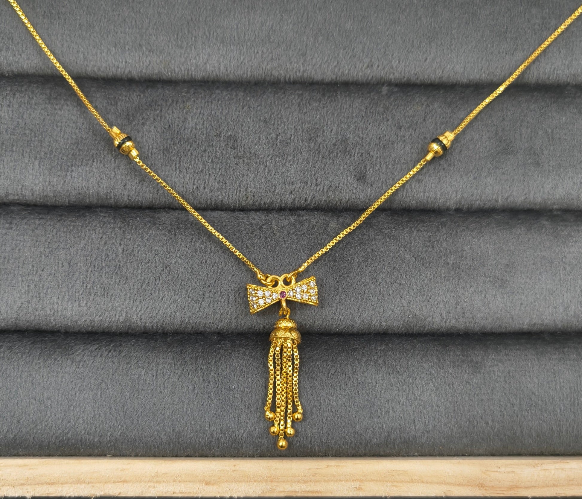 Daily Wear Black Beaded Classic Bow Pendant Mangalsutra