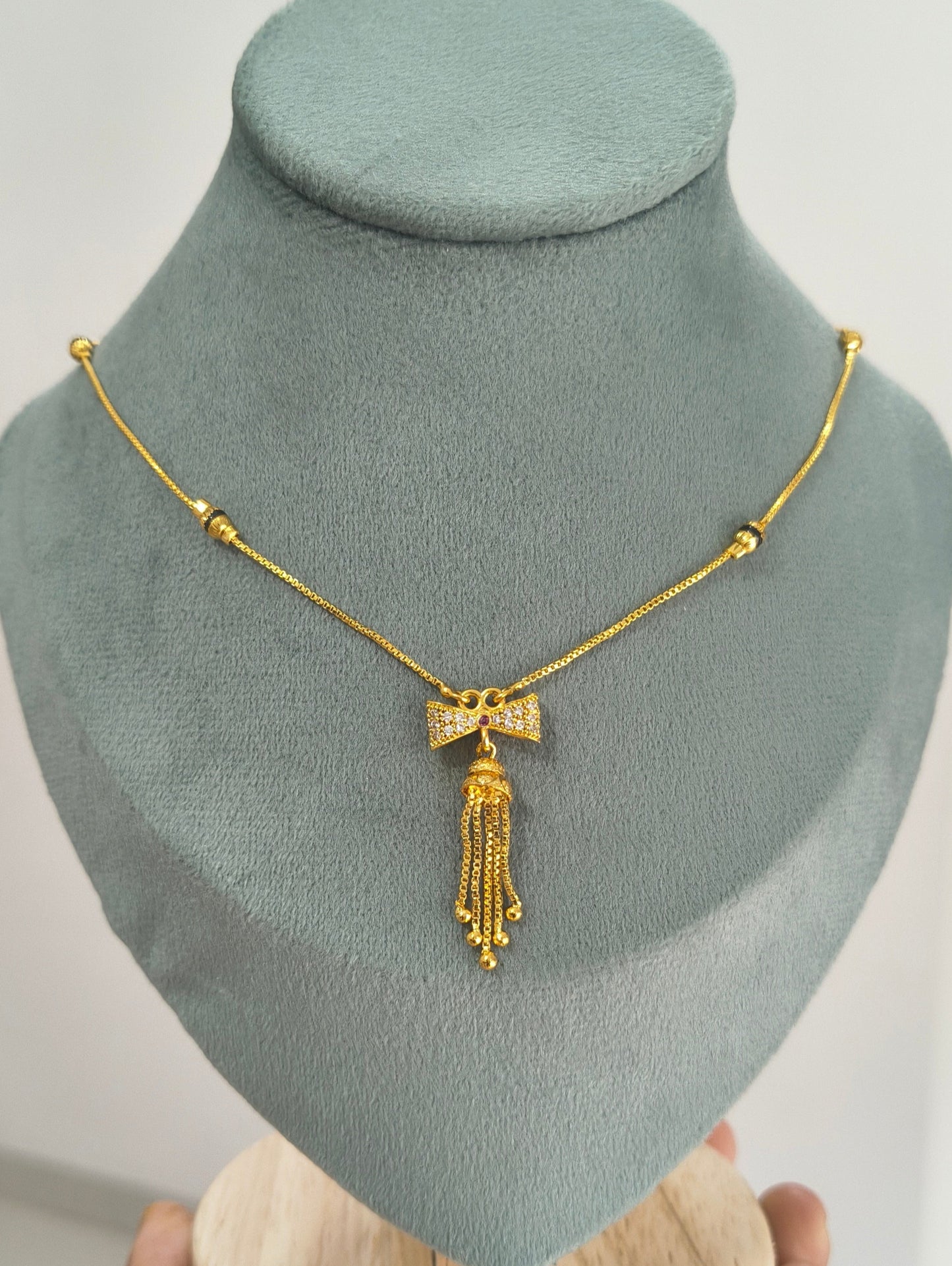 Daily Wear Black Beaded Classic Bow Pendant Mangalsutra