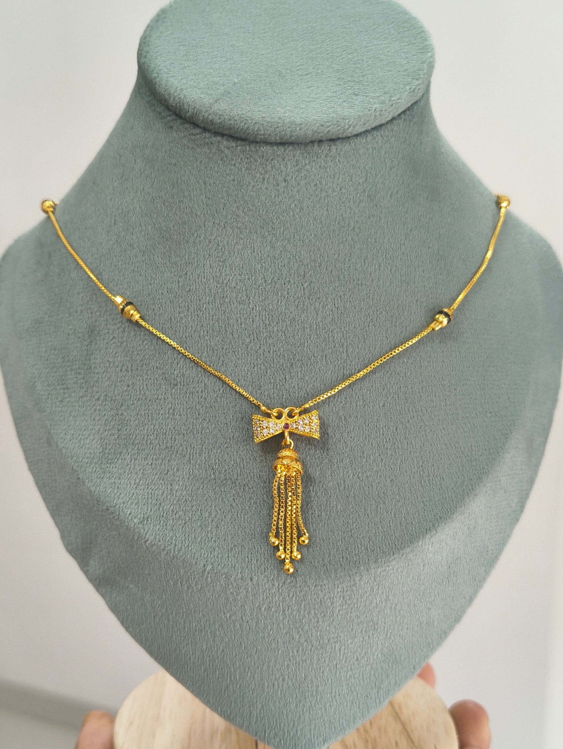 Daily Wear Black Beaded Classic Bow Pendant Mangalsutra