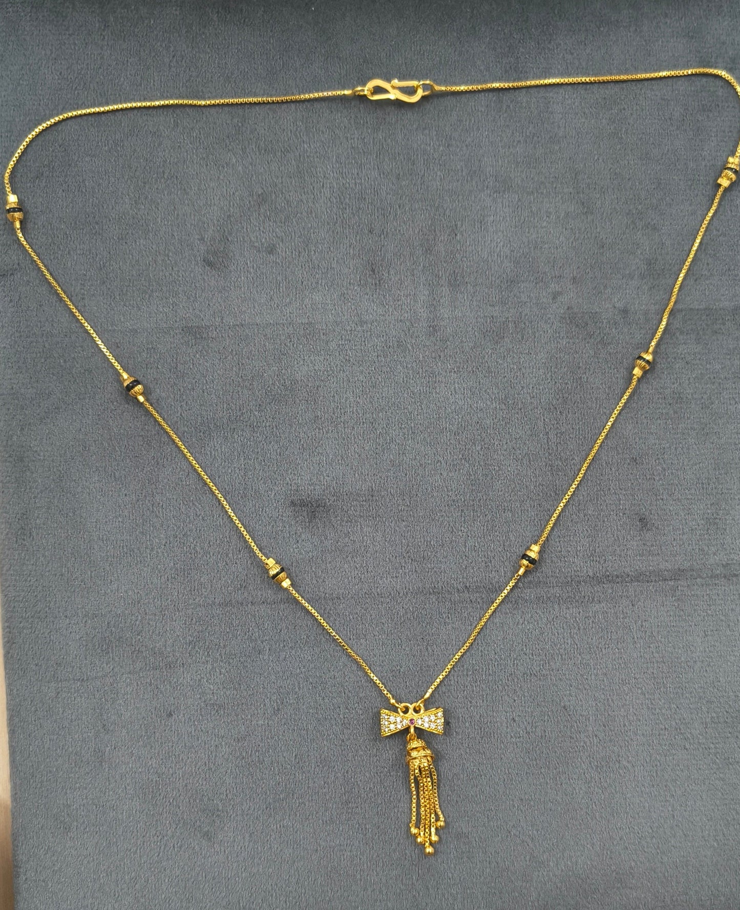 Daily Wear Black Beaded Classic Bow Pendant Mangalsutra