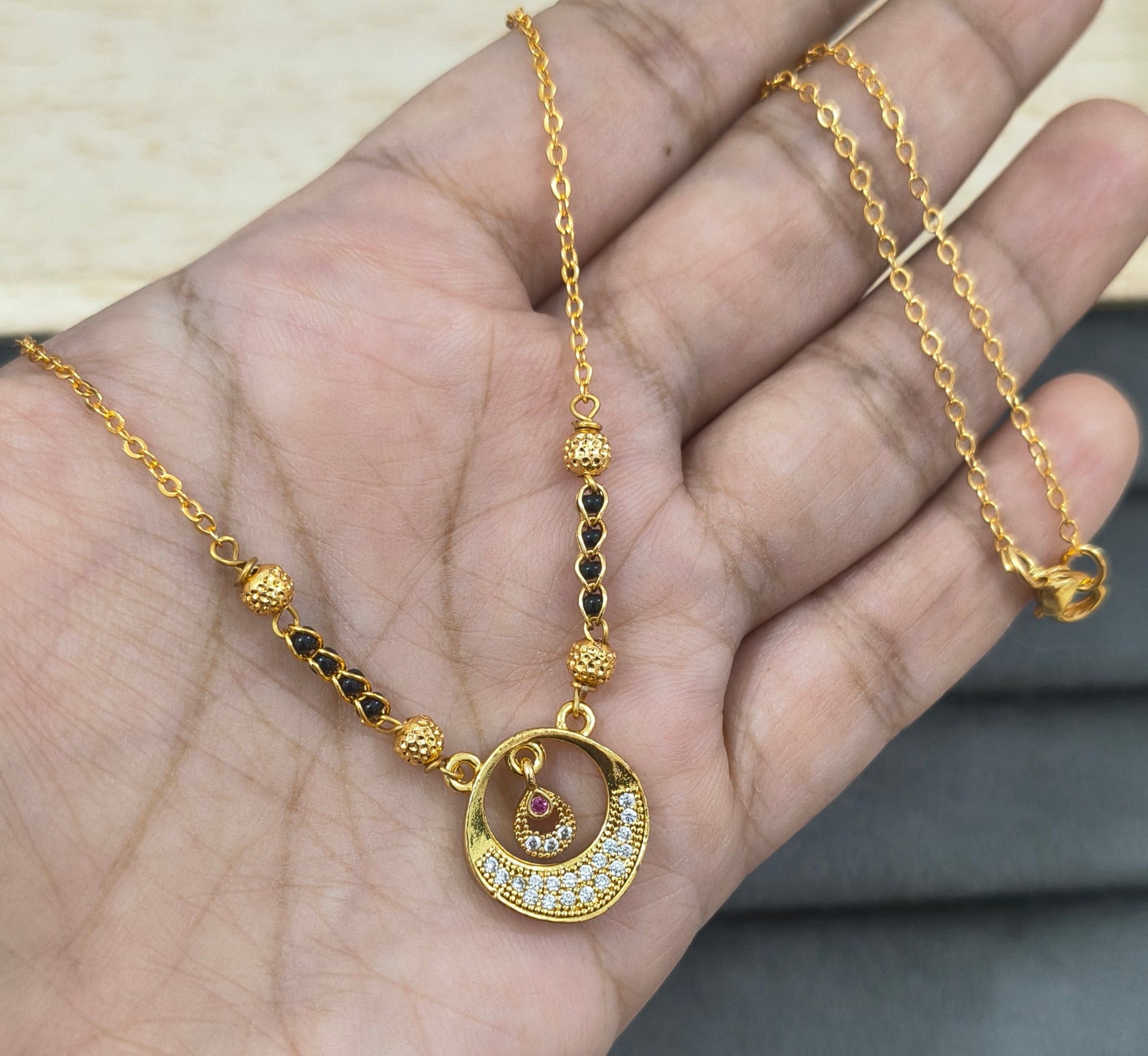 Daily Wear Black Beaded Fancy Round Pendant Mangalsutra
