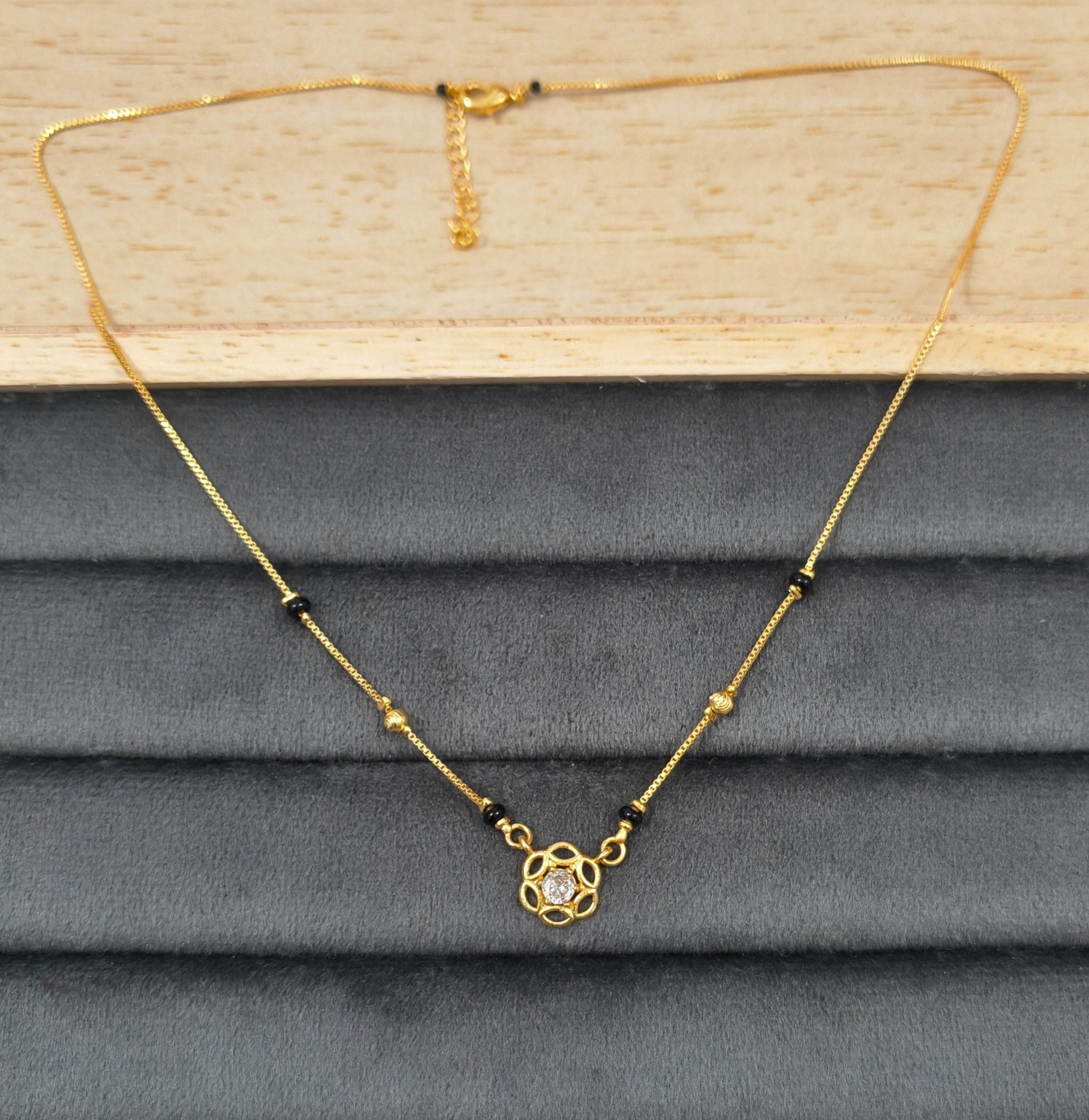 Daily Wear Black Beaded Floral Solitaire Pendant Mangalsutra