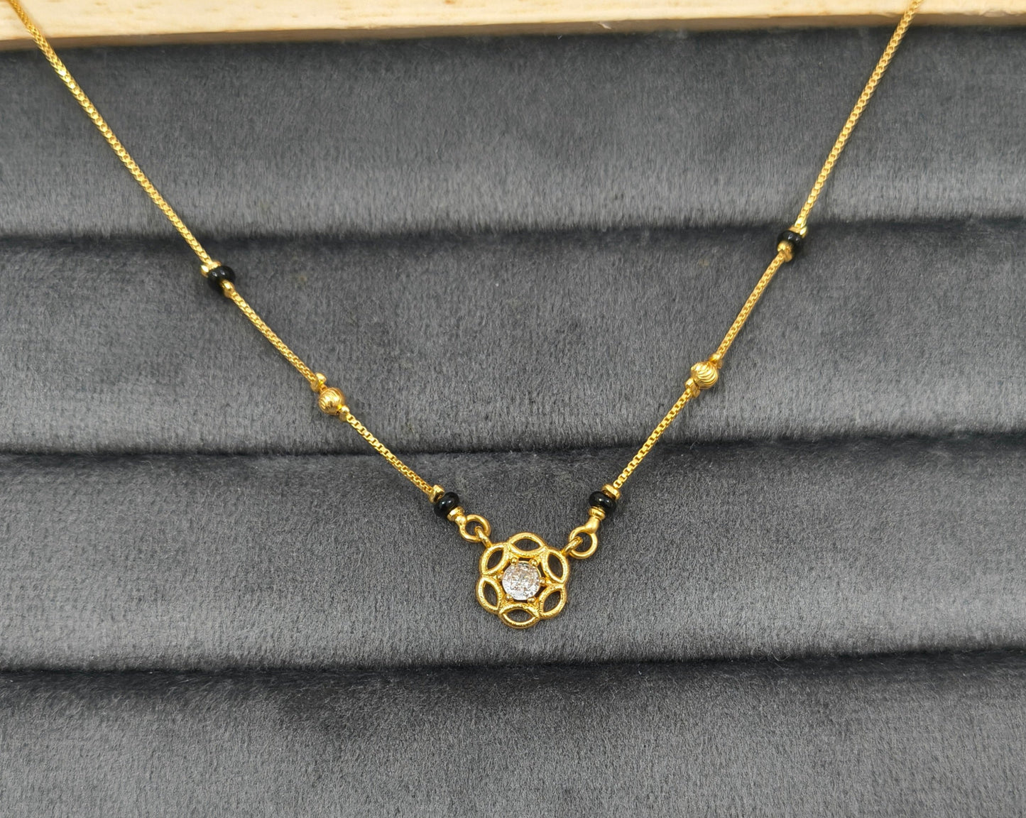 Daily Wear Black Beaded Floral Solitaire Pendant Mangalsutra