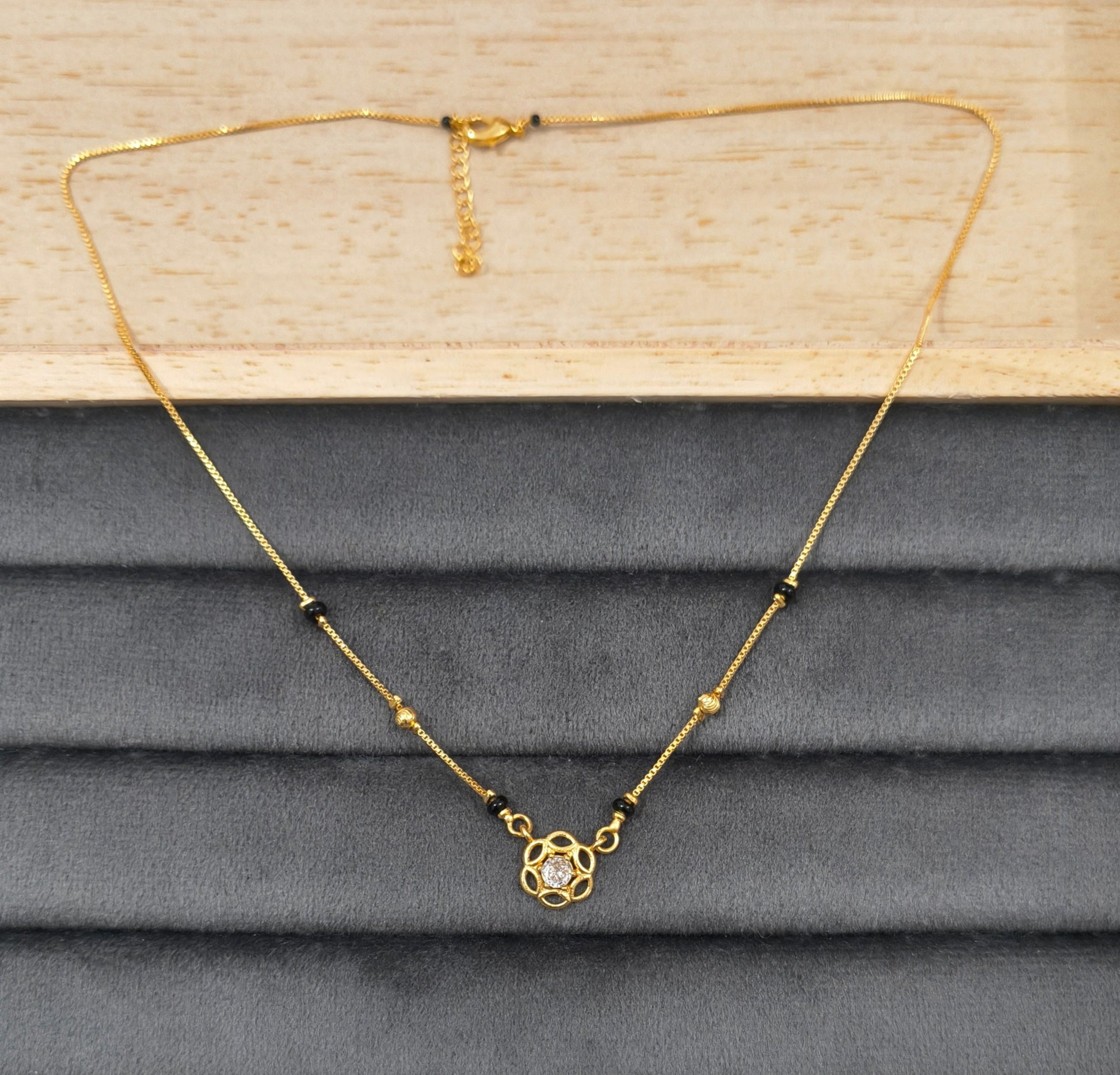 Daily Wear Black Beaded Floral Solitaire Pendant Mangalsutra