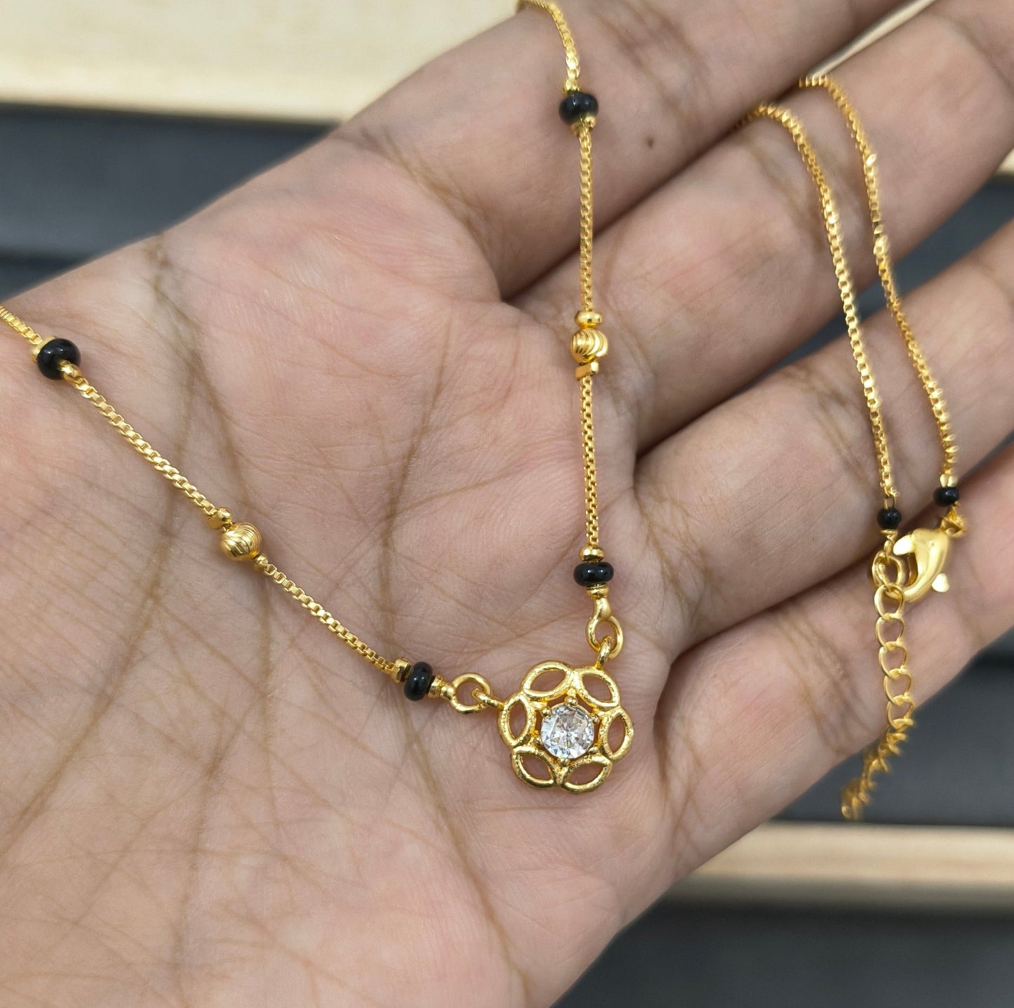 Daily Wear Black Beaded Floral Solitaire Pendant Mangalsutra