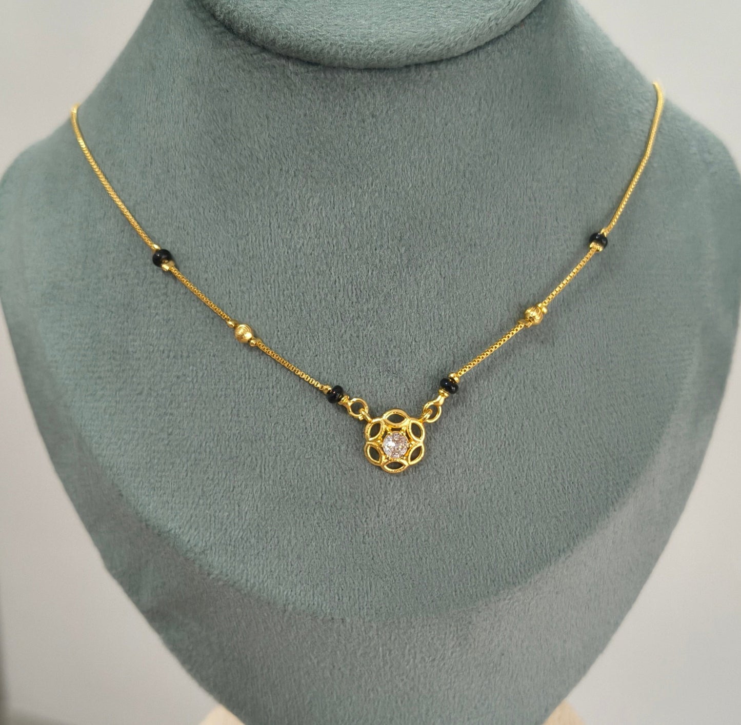 Daily Wear Black Beaded Floral Solitaire Pendant Mangalsutra