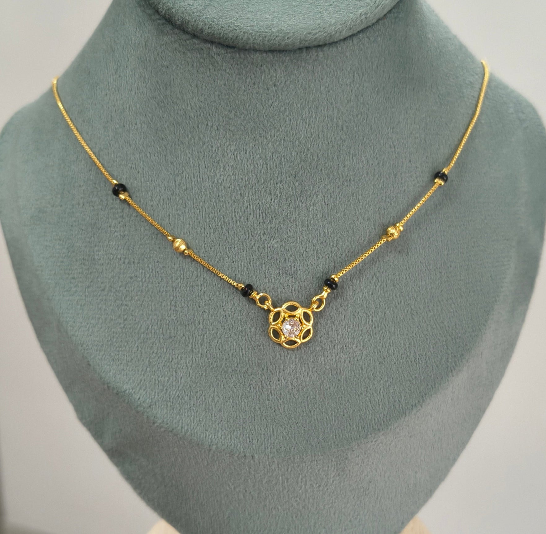 Daily Wear Black Beaded Floral Solitaire Pendant Mangalsutra
