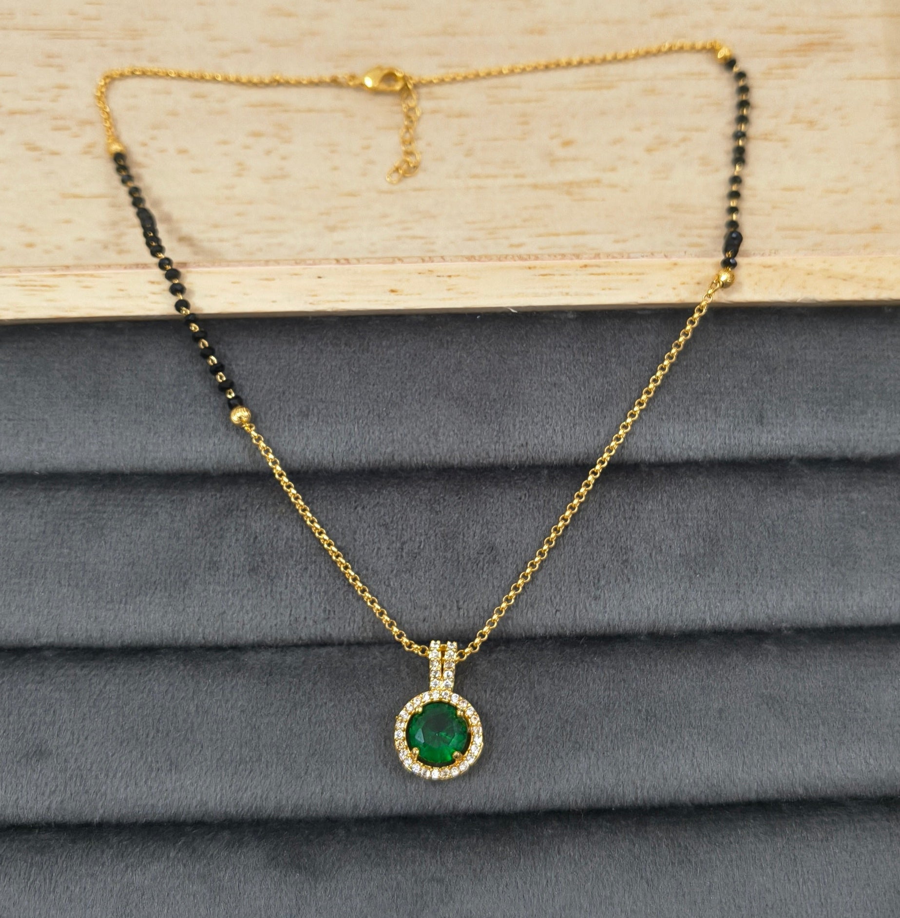 Daily Wear Black Beaded Green Stone Pendant Mangalsutra