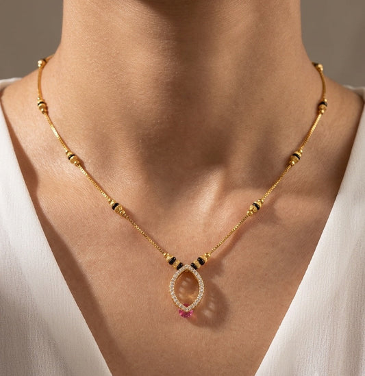 Daily Wear Black Beaded Hollow Oval Pendant Mangalsutra