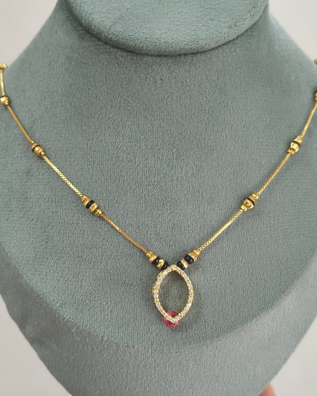 Daily Wear Black Beaded Hollow Oval Pendant Mangalsutra