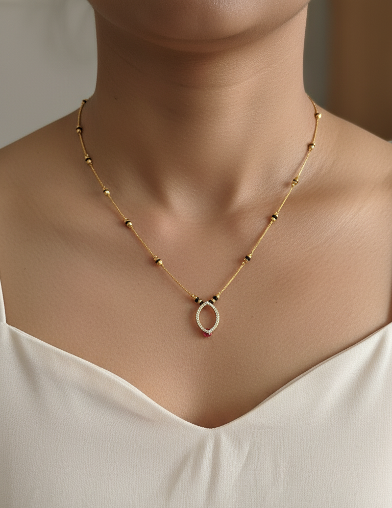 Daily Wear Black Beaded Hollow Oval Pendant Mangalsutra