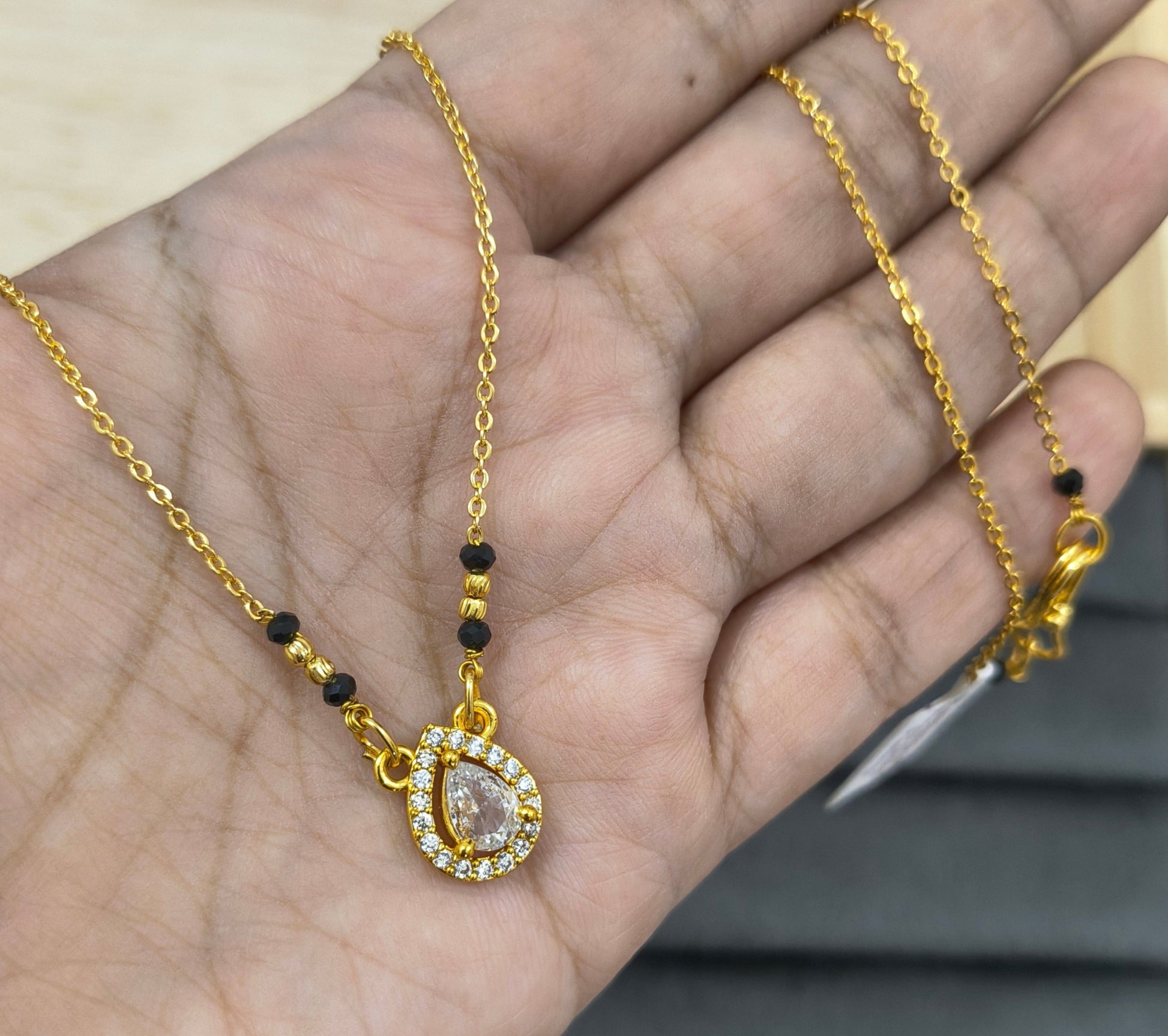 Daily Wear Black Beaded Oval Solitaire Pendant Mangalsutra