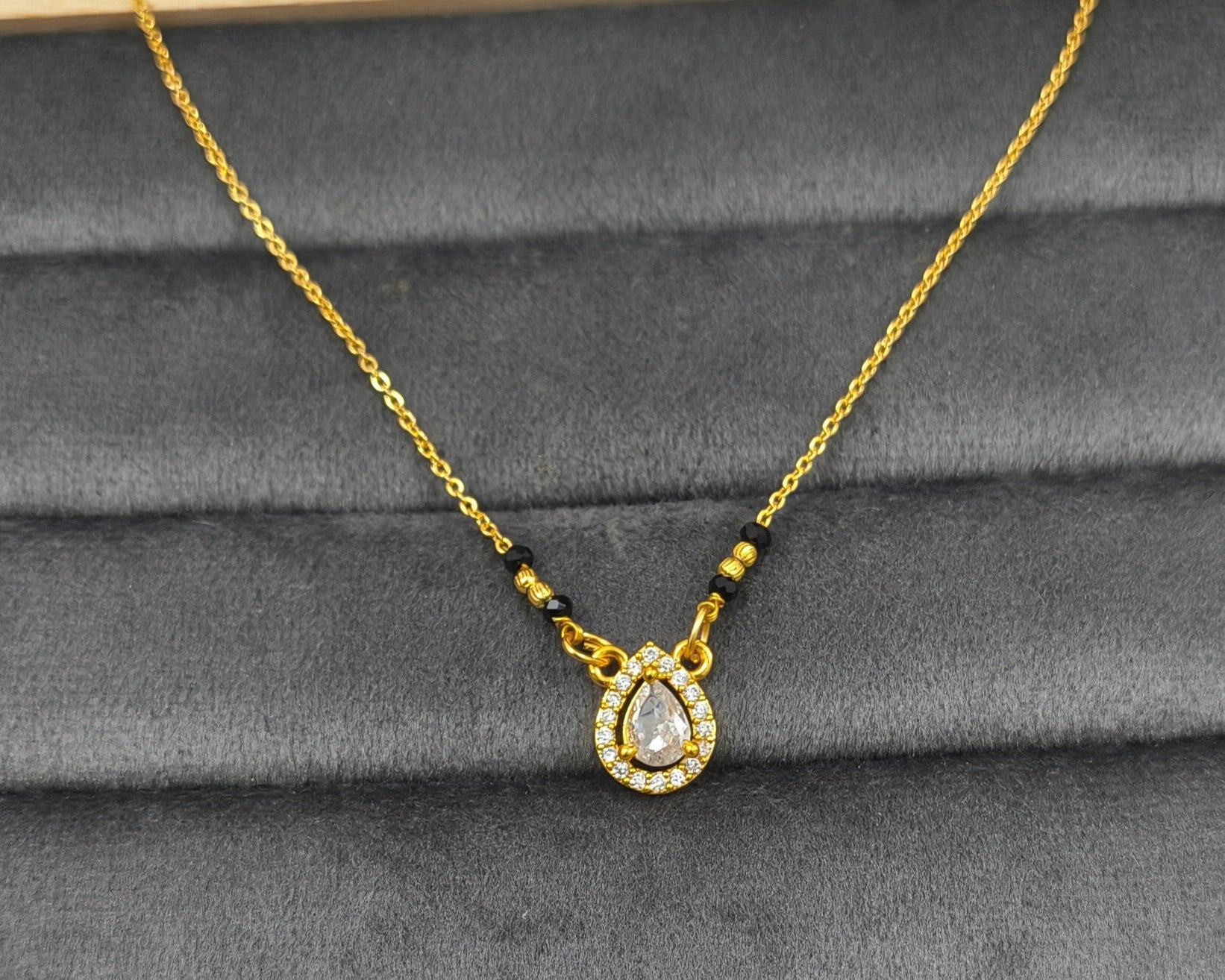 Daily Wear Black Beaded Oval Solitaire Pendant Mangalsutra