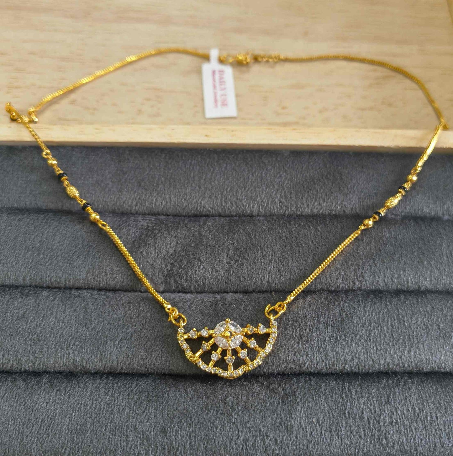 Daily Wear Mangalsutra Black Beaded AD Crown Pendant