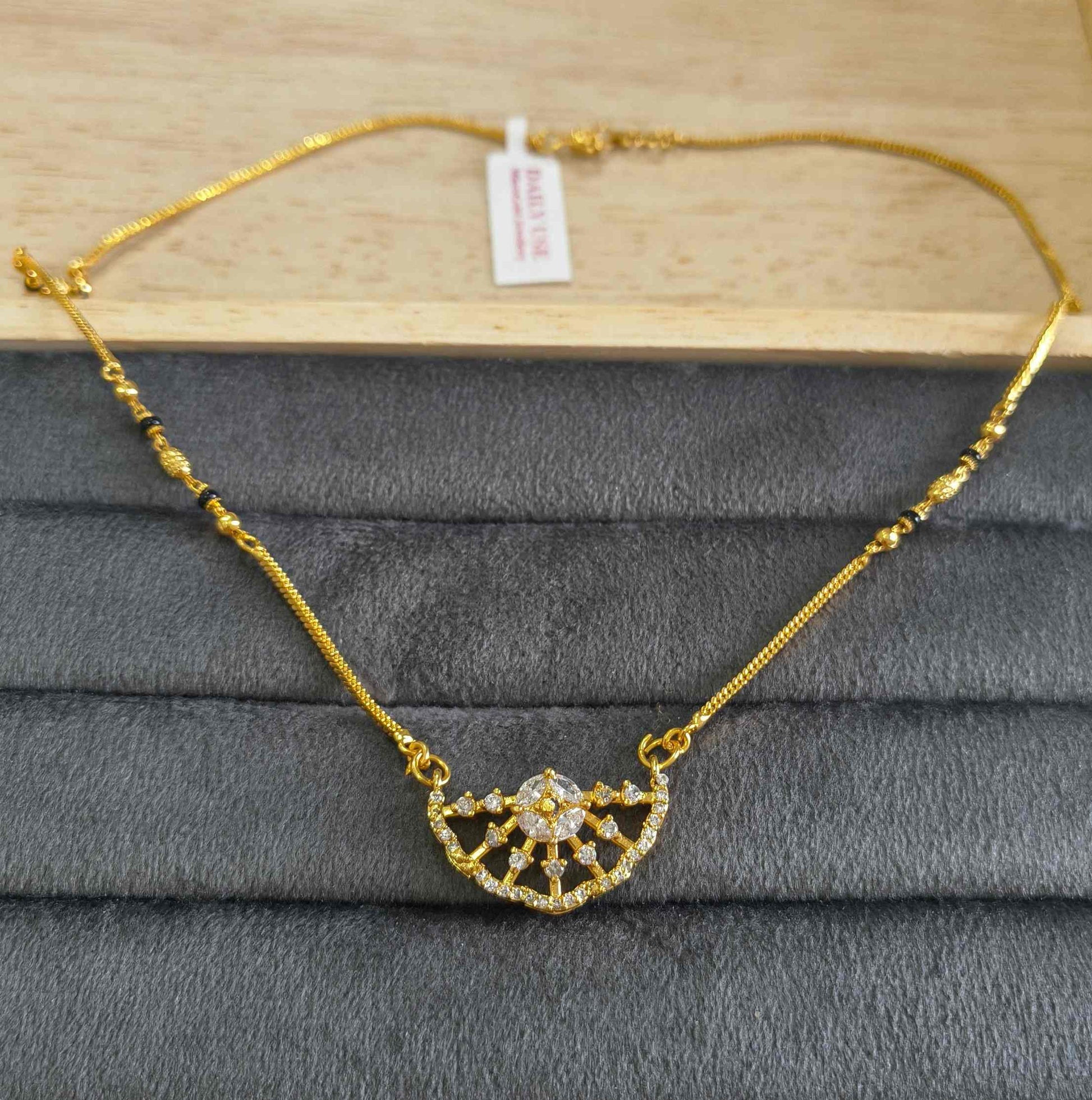 Daily Wear Mangalsutra Black Beaded AD Crown Pendant