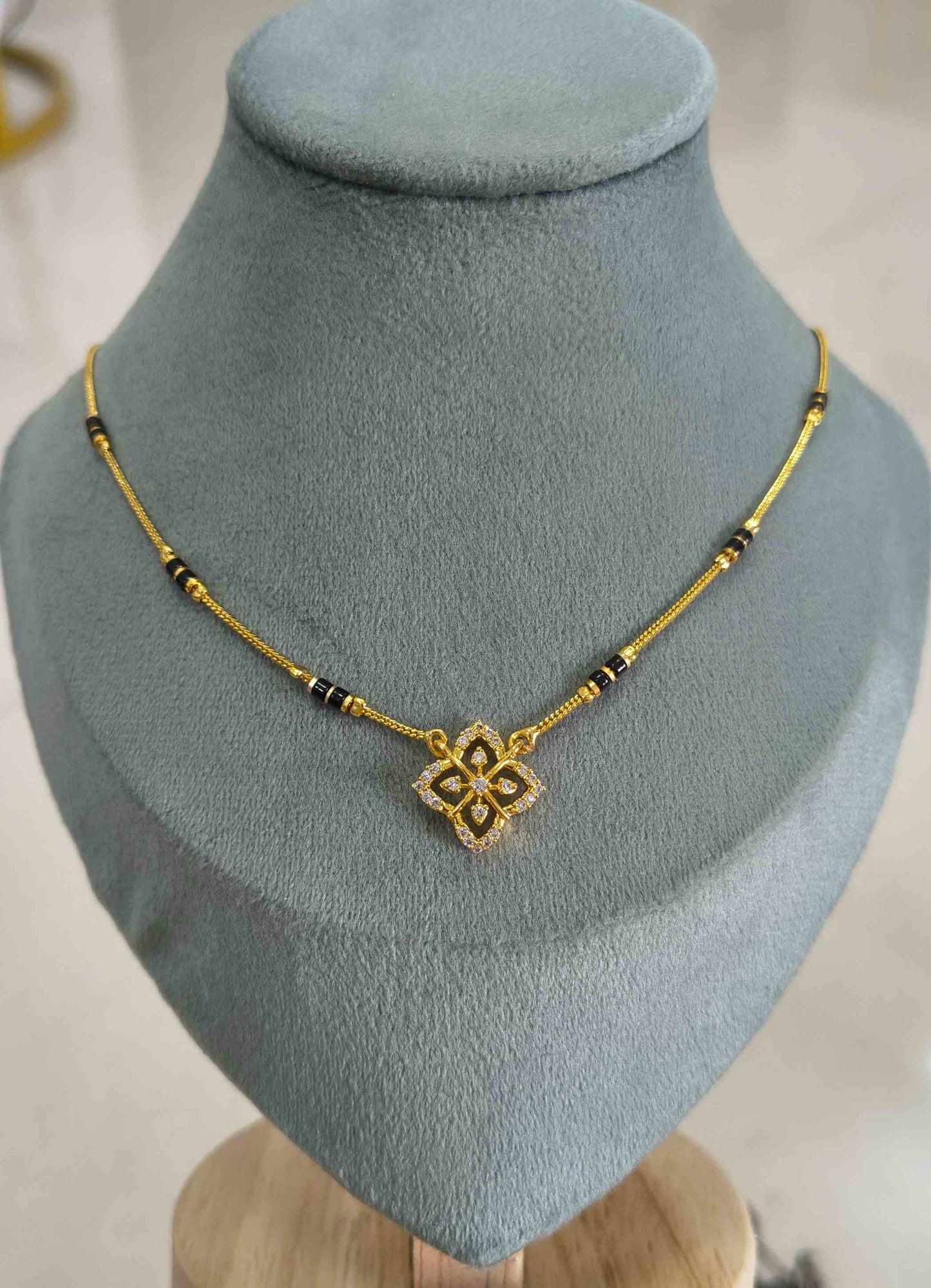 Daily Wear Mangalsutra Black Beaded AD Flower Pendant