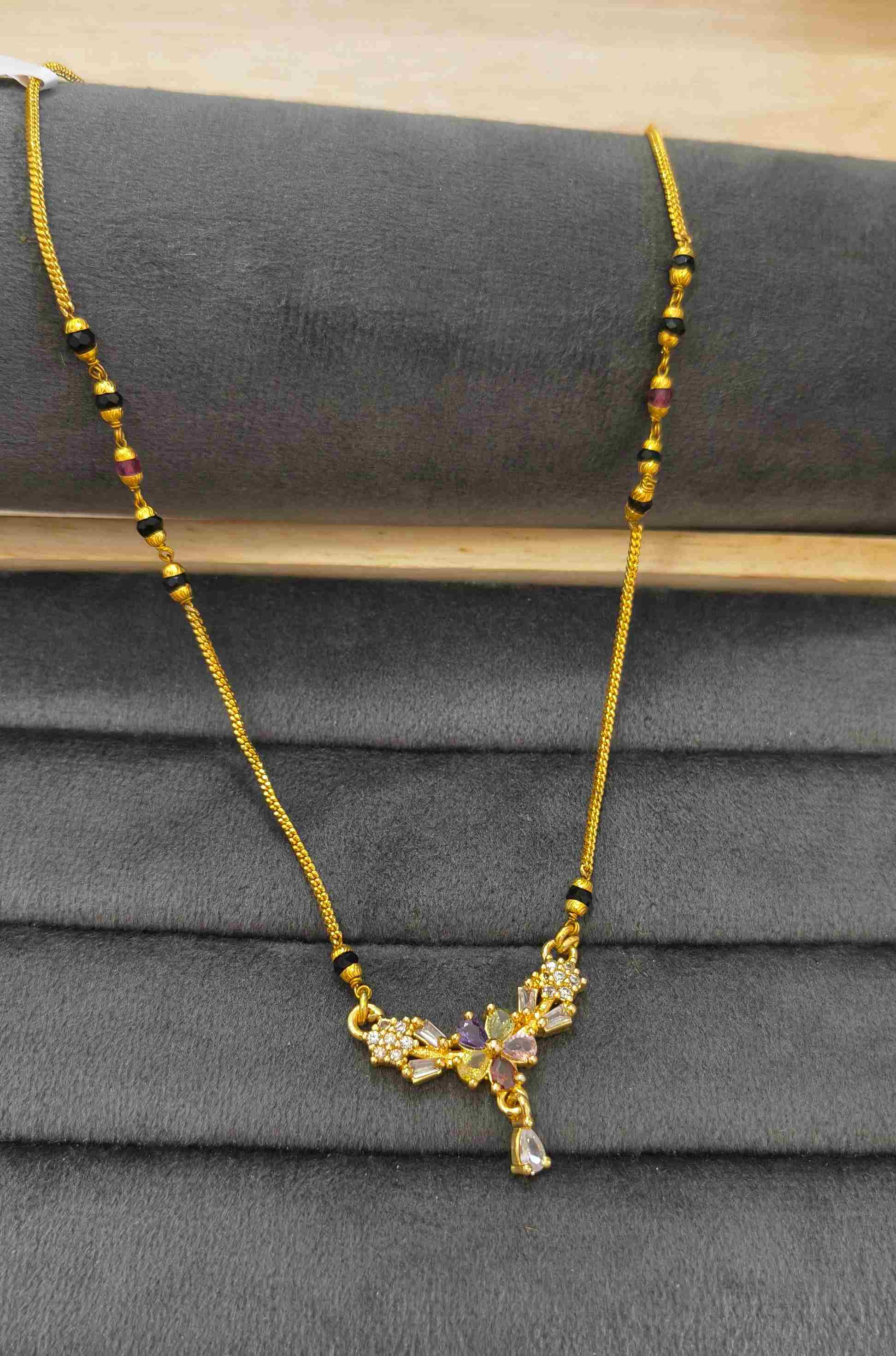 Daily Wear Mangalsutra Black Beaded Multi Stone Pendant