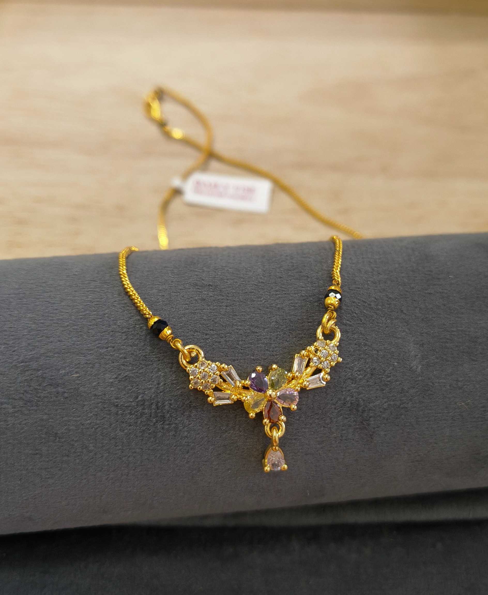 Daily Wear Mangalsutra Black Beaded Multi Stone Pendant