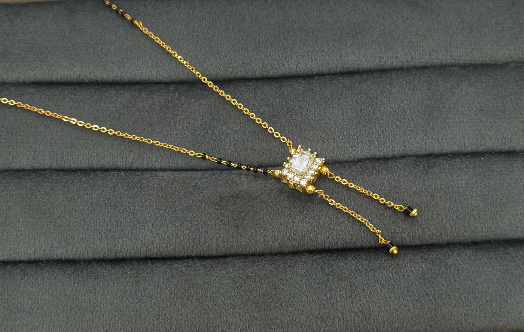 Modern Micro gold plated daily wear mangalsutra with rectangular CZ diamond pendant and invisible black bead chain