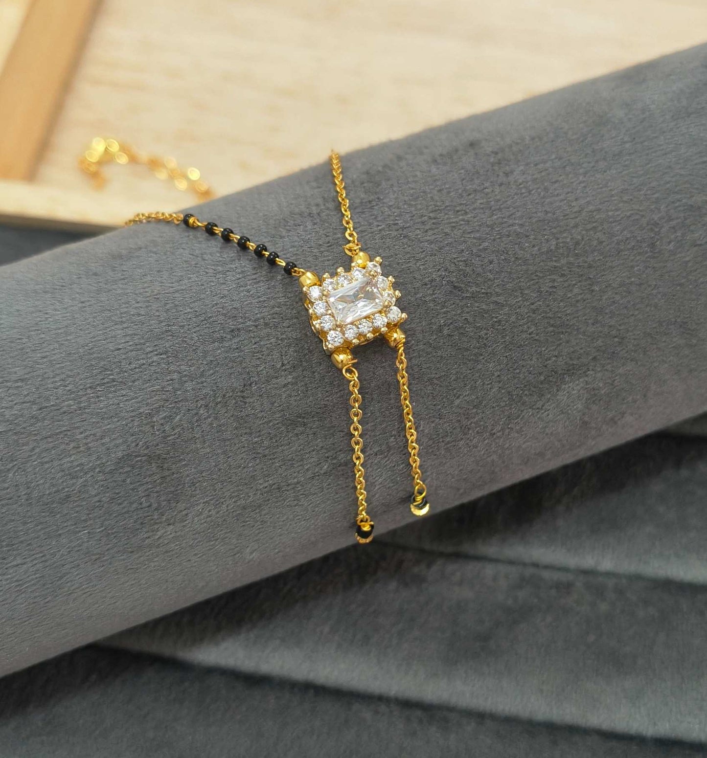 Modern Micro gold plated daily wear mangalsutra with rectangular CZ diamond pendant and invisible black bead chain
