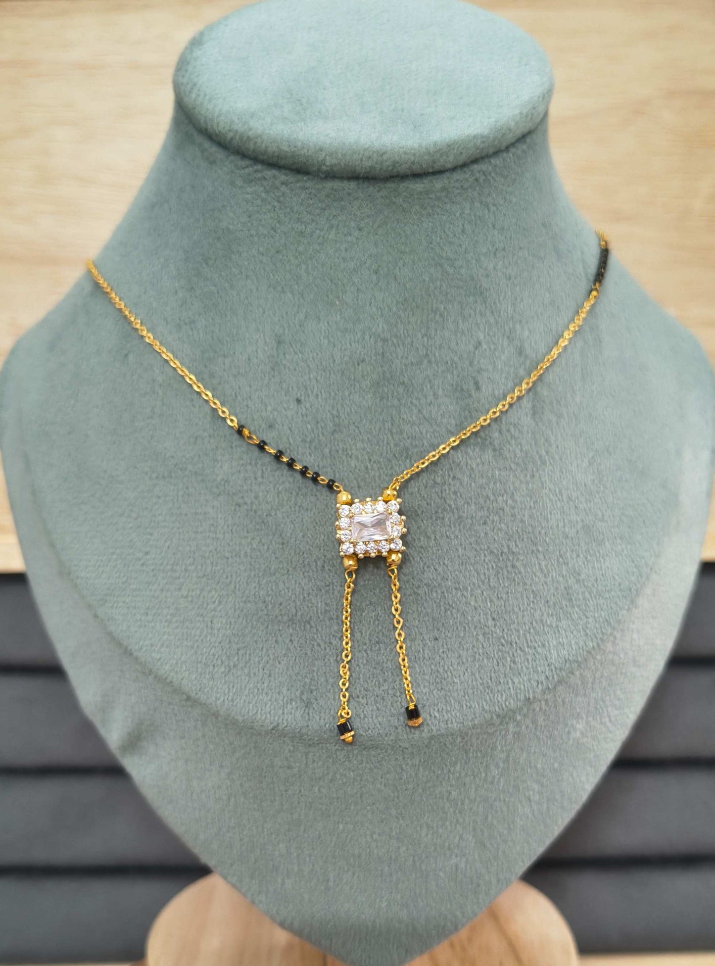 Modern Micro gold plated daily wear mangalsutra with rectangular CZ diamond pendant and invisible black bead chain