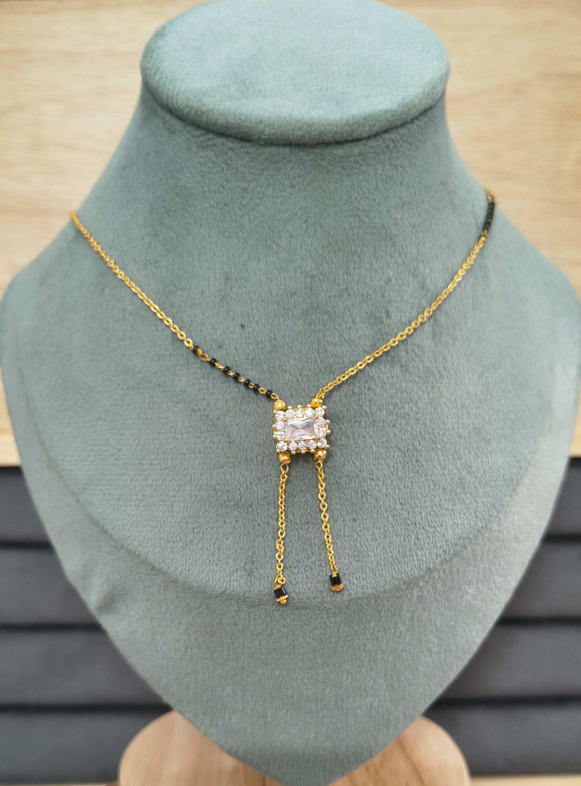 Modern Micro gold plated daily wear mangalsutra with rectangular CZ diamond pendant and invisible black bead chain