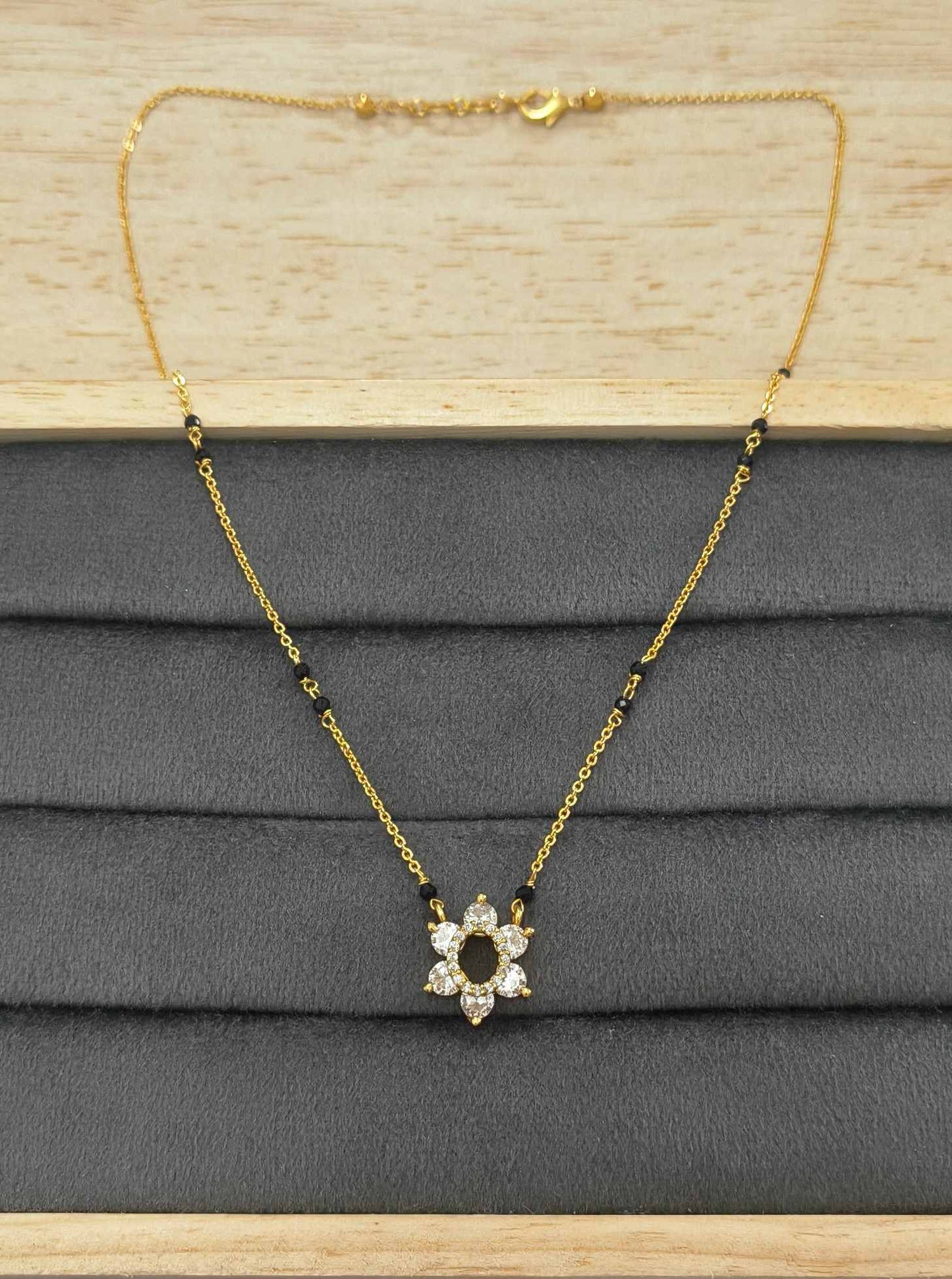 Daily Wear Mangalsutra with Shiny Diamond Flower Pendant
