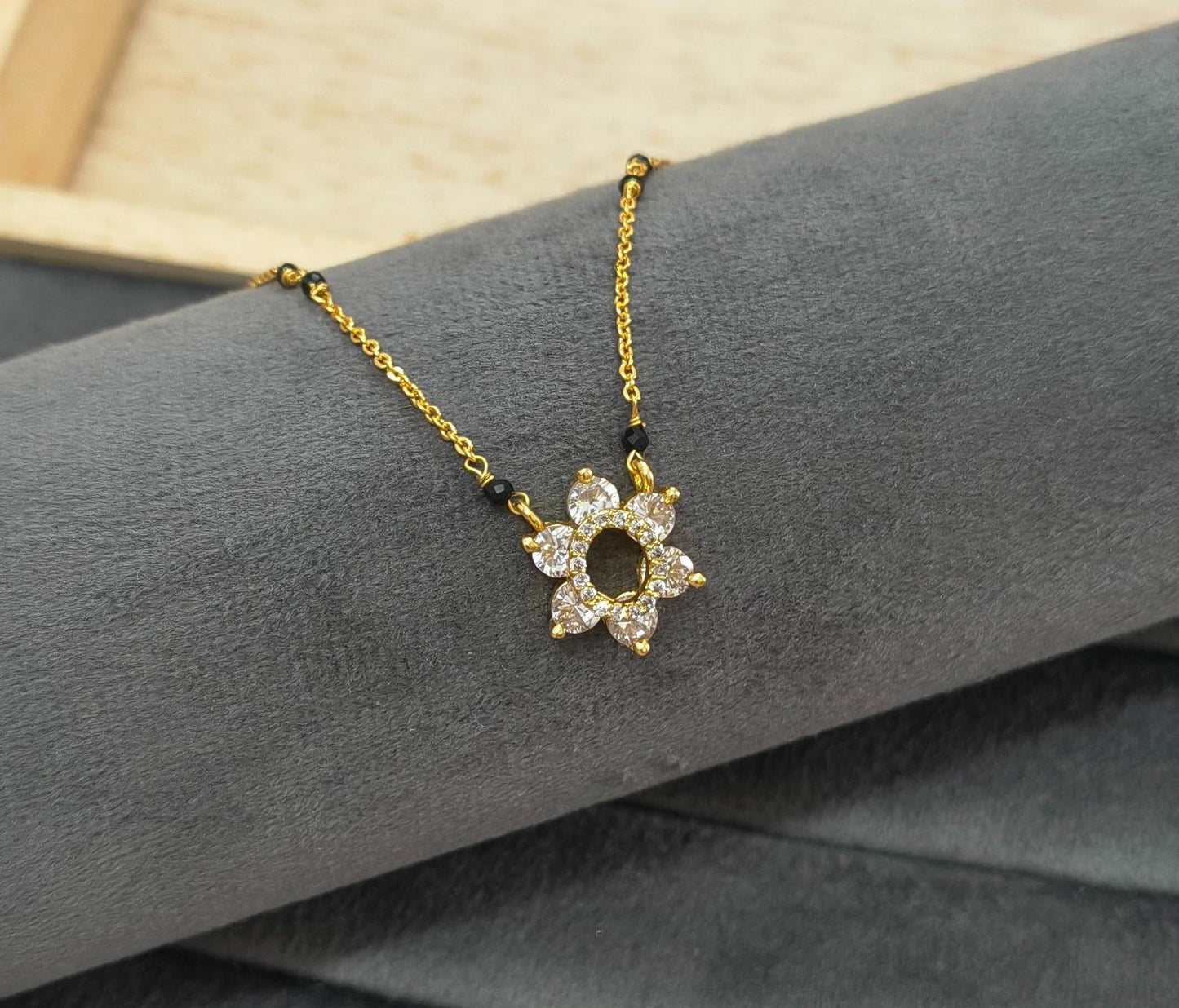 Daily Wear Mangalsutra with Shiny Diamond Flower Pendant