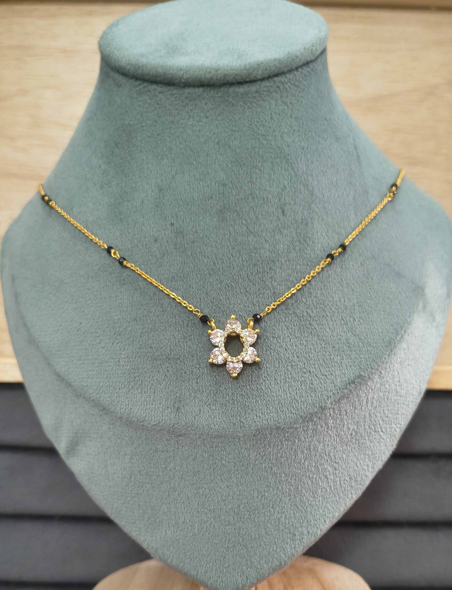 Daily Wear Mangalsutra with Shiny Diamond Flower Pendant