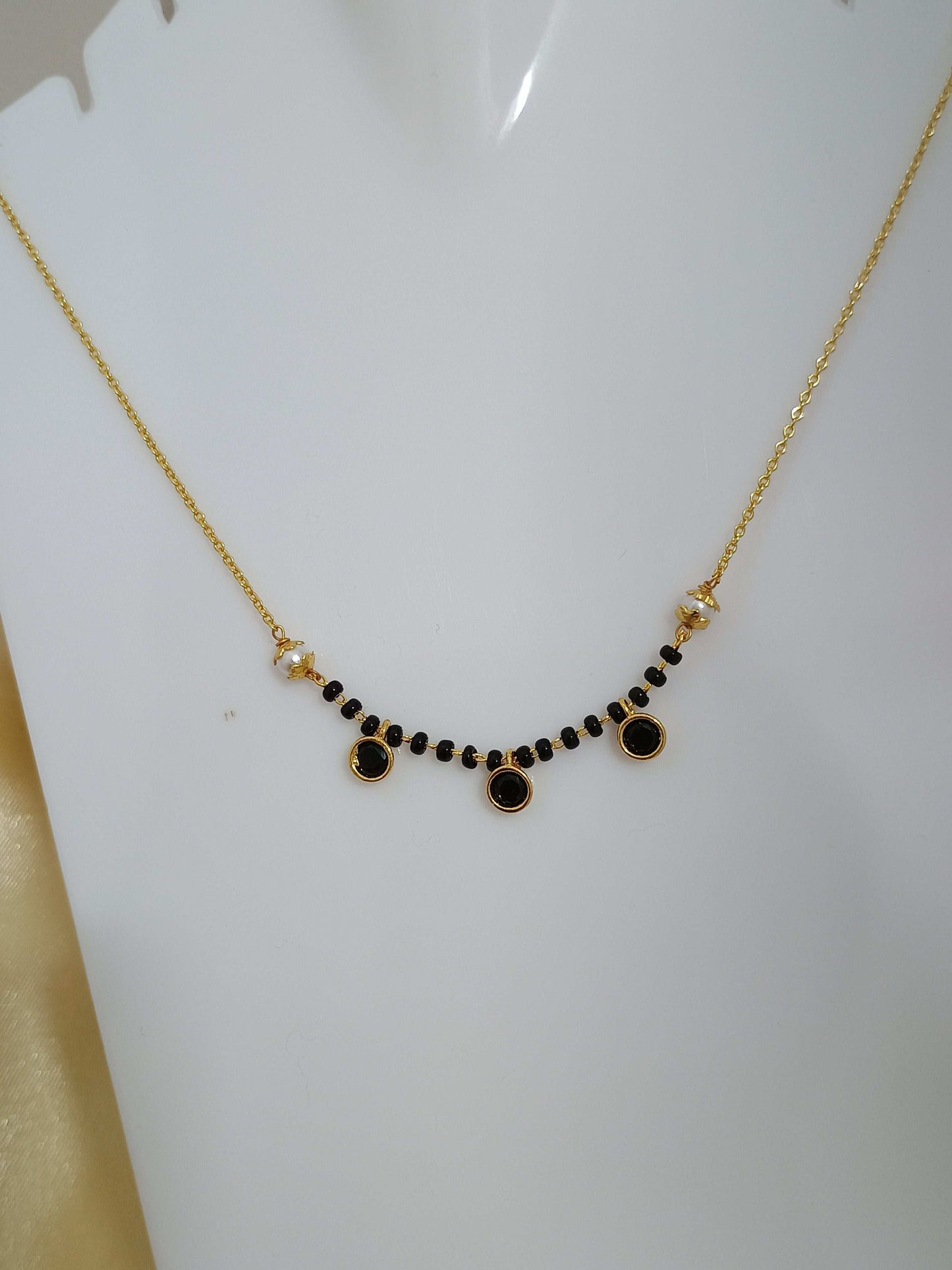 Dazzling Mangalsutra Chain With Black Stones Gold Plated 