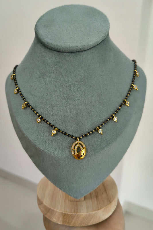 Dazzling Stone Studded Oval Pendant Beaded Mangalsutra Chain