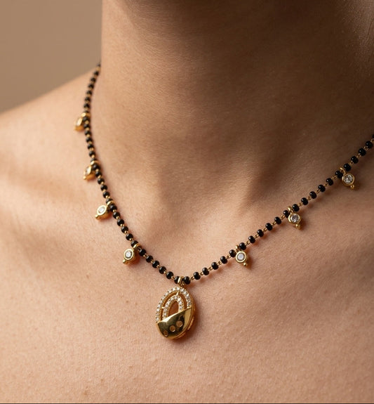 Dazzling Stone Studded Oval Pendant Beaded Mangalsutra Chain