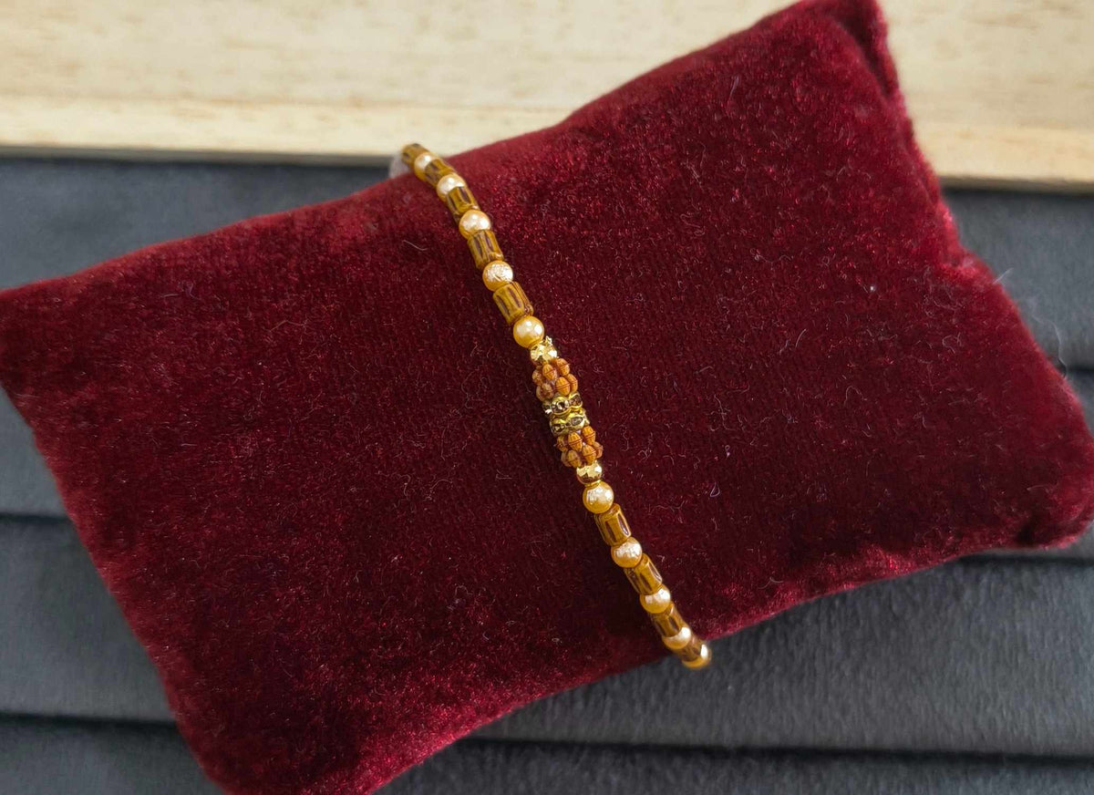 Designer Golden and Wooden Beads Rakhi for Brother