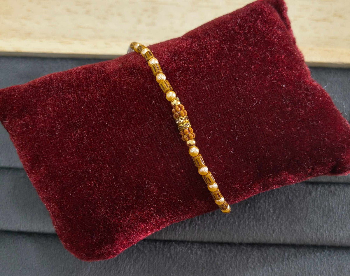 Designer Golden and Wooden Beads Rakhi for Brother