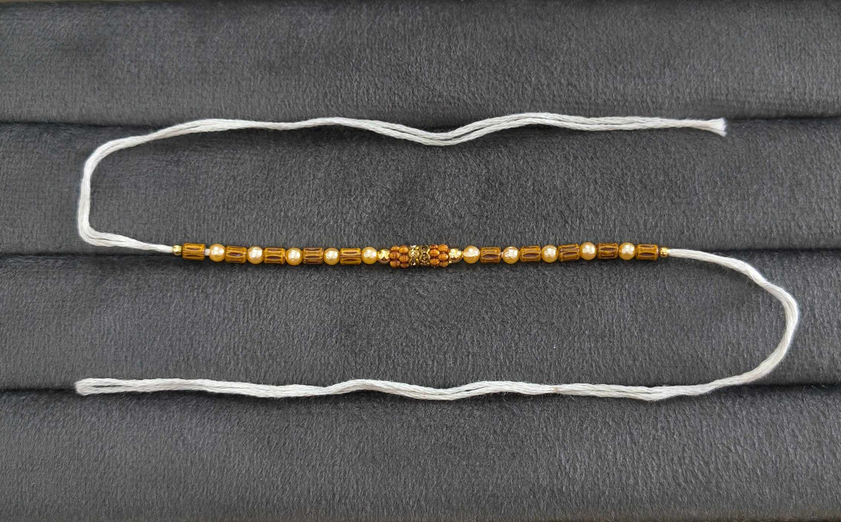 Designer Golden and Wooden Beads Rakhi for Brother